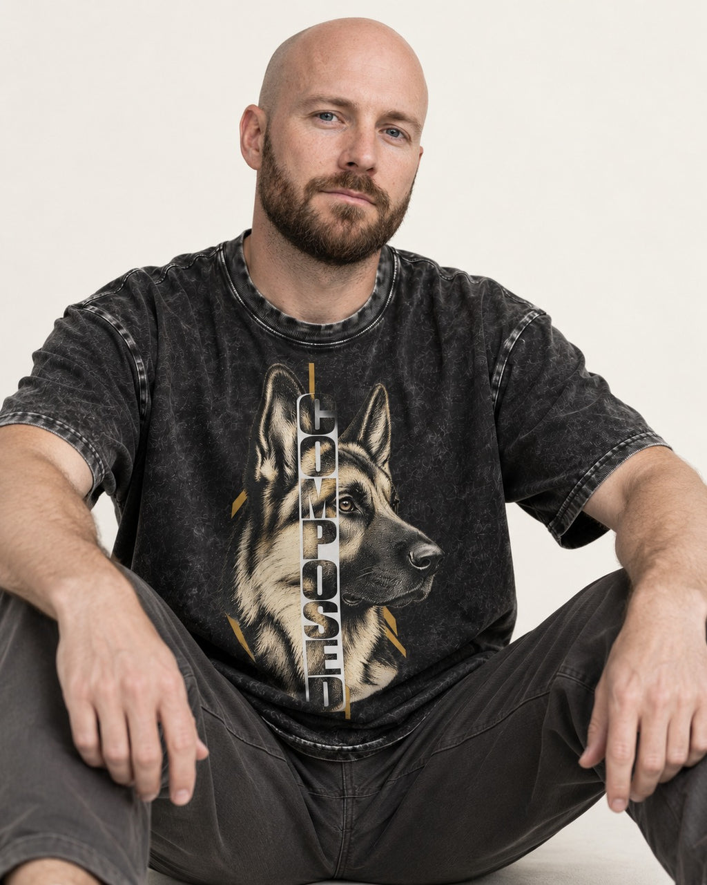 Composed Profile German Shepherd Dog Graphic Washed Tee in Black, worn by a seated model