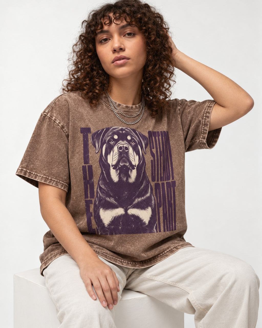 Rottweiler The Steady Part Washed Tee in Coffee, worn by a seated model