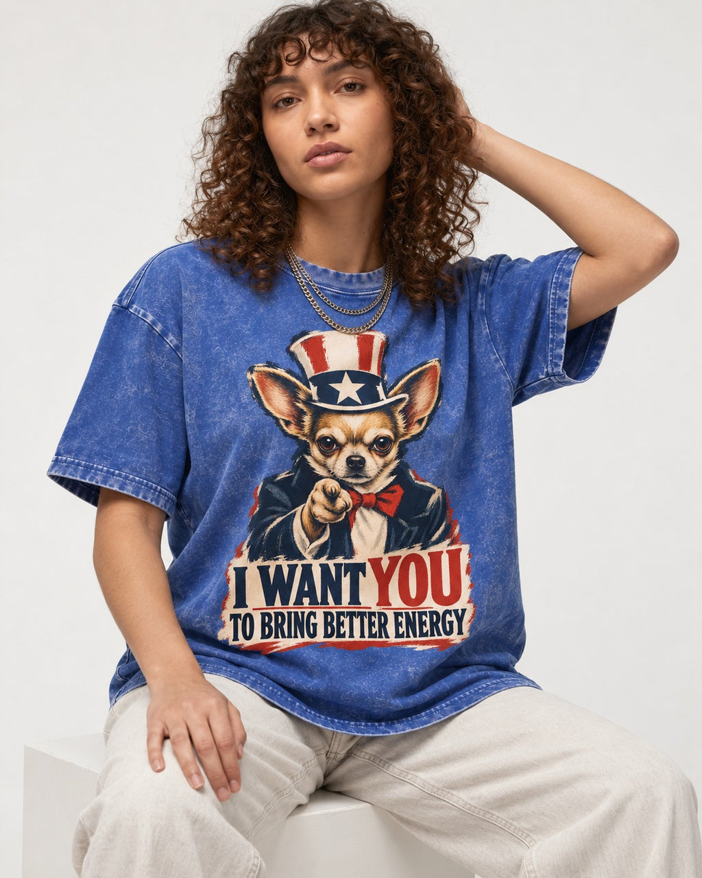 Chihuahua I Want You to Bring Better Energy Uncle Sam Graphic Washed Tee in Royal Blue, worn by a seated model