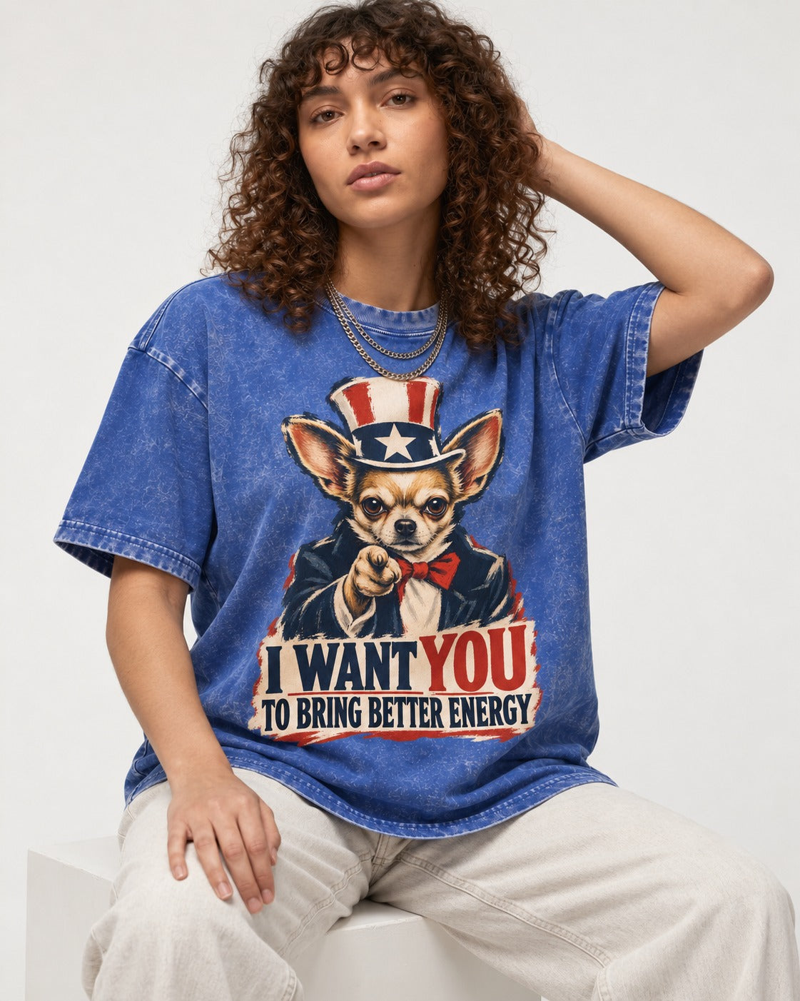 Chihuahua I Want You to Bring Better Energy Uncle Sam Graphic Washed Tee in Royal Blue, worn by a seated model