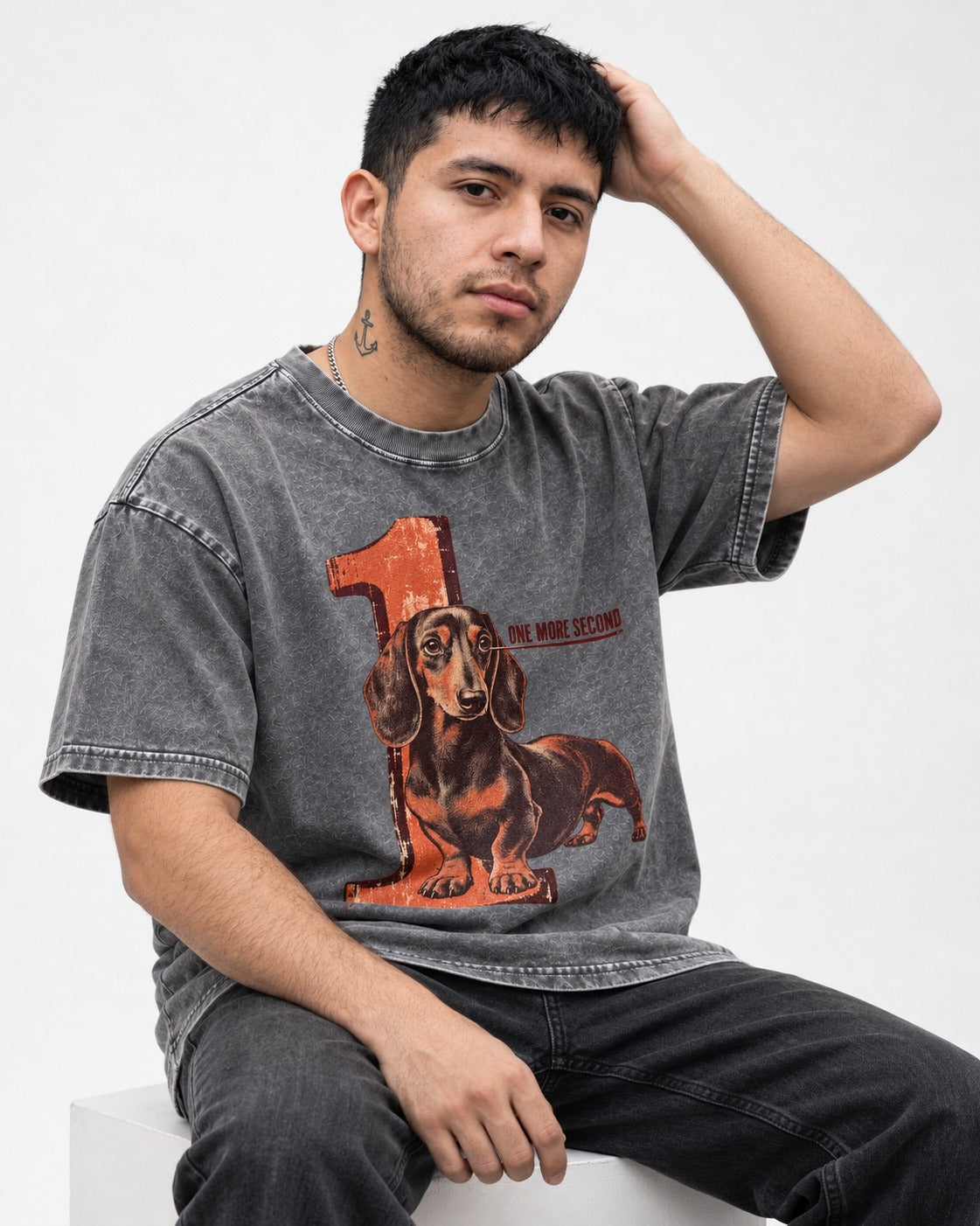 One More Second Dachshund Washed Tee in Gray, worn by a seated model