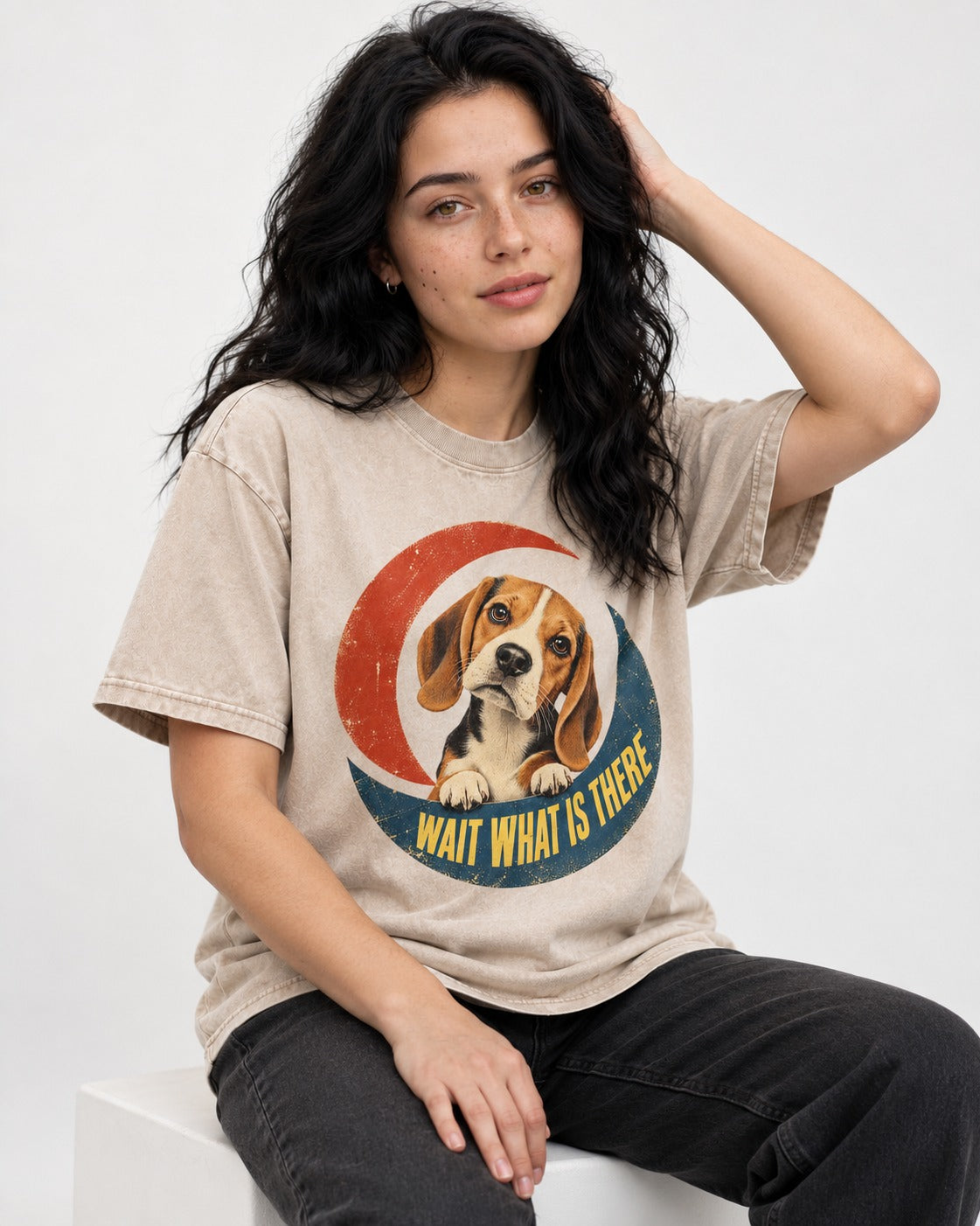 Wait What Is There Beagle Crescent Washed Tee in Apricot, worn by a seated model