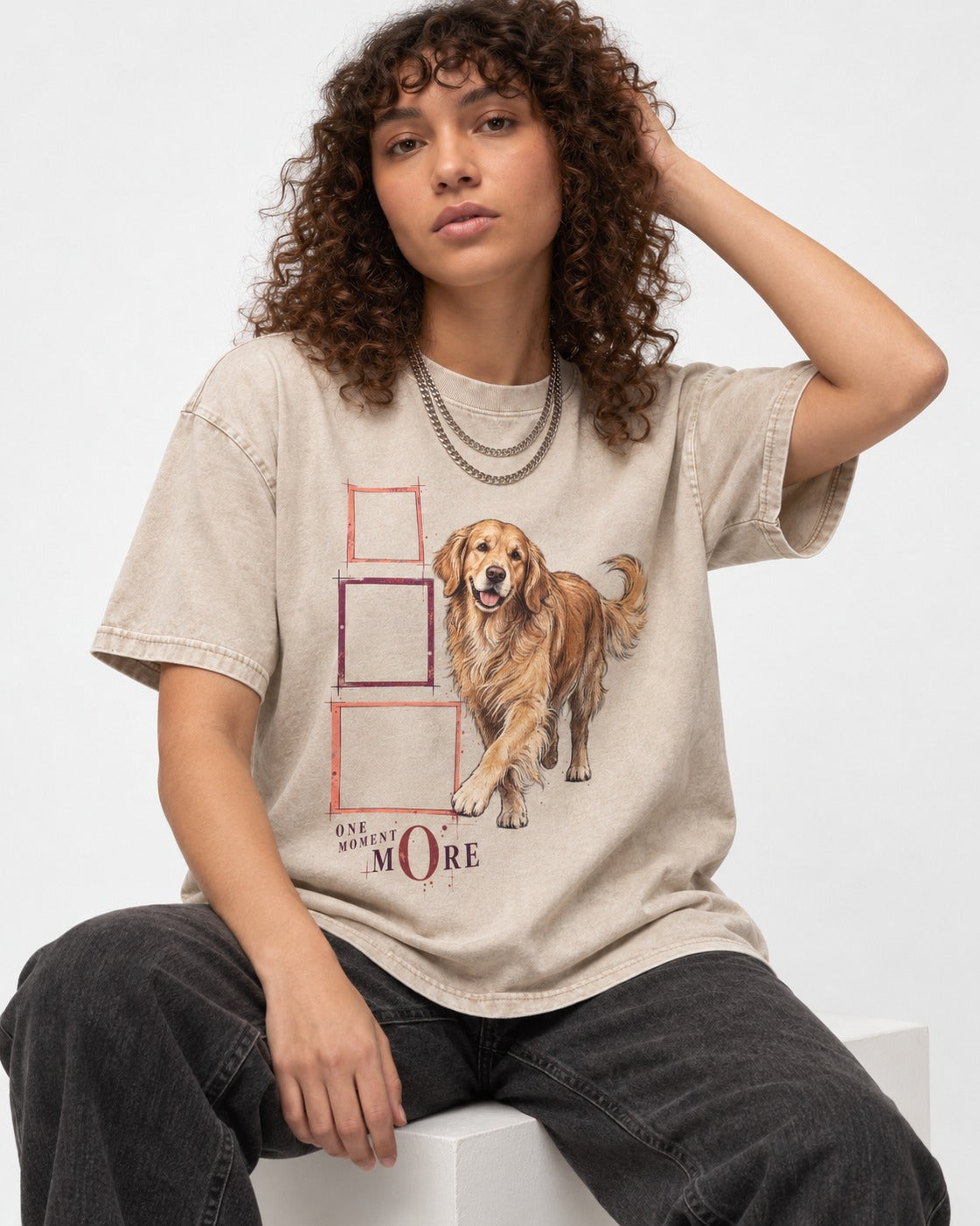 Golden Retriever One Moment More Washed Tee in Apricot, worn by a seated model