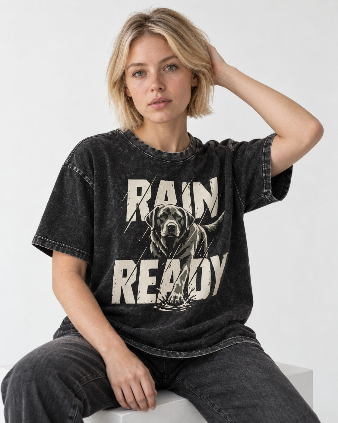 Labrador Retriever Rain Ready Charging Splash Graphic Washed Tee in Black, worn by a seated model