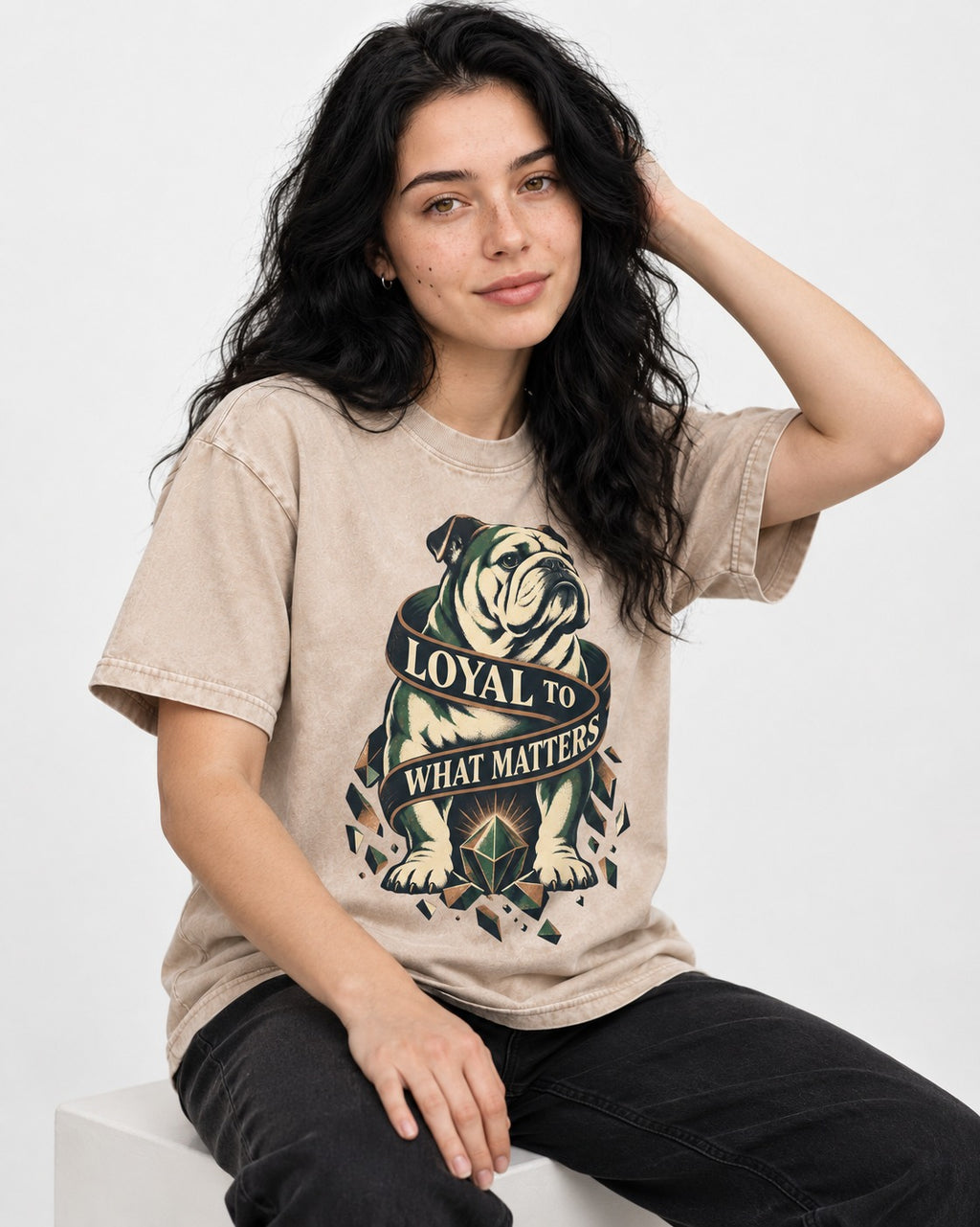 Loyal to What Matters English Bulldog Washed Tee in Apricot, worn by a seated model