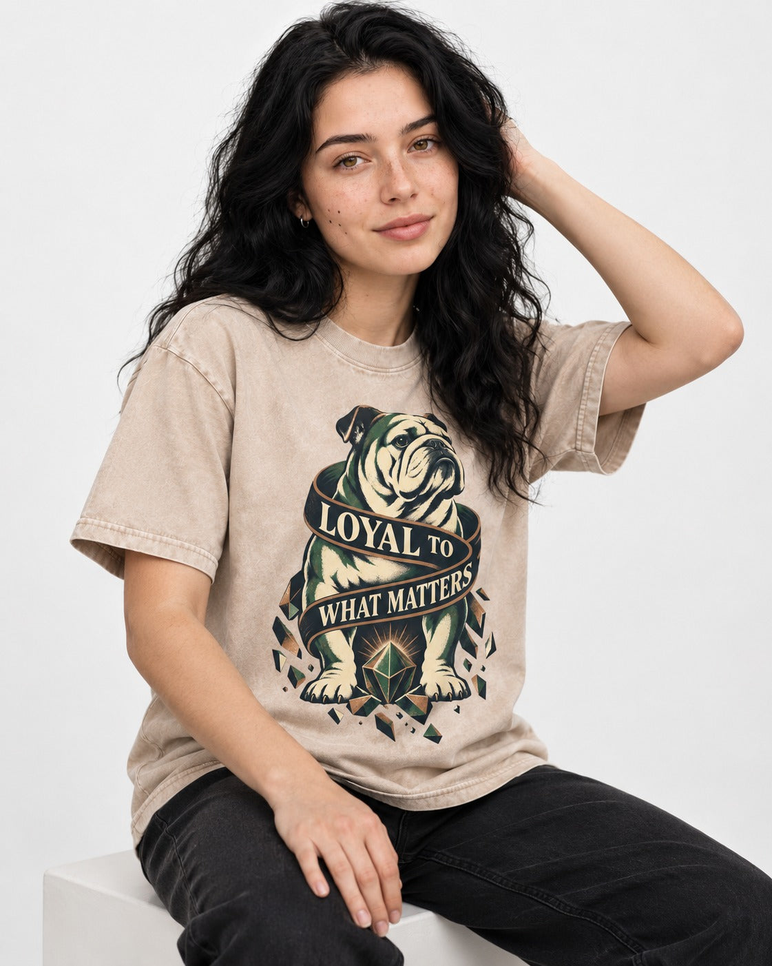 Loyal to What Matters English Bulldog Washed Tee in Apricot, worn by a seated model