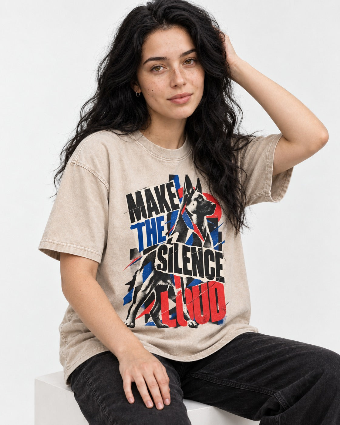 German Shepherd Dog Make the Silence Loud Washed Tee in Apricot, worn by a seated model