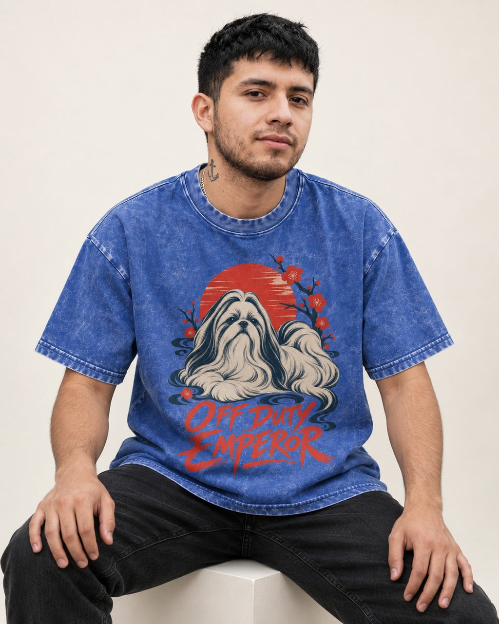 Shih Tzu Off Duty Emperor Sunset Blossom Graphic Washed Tee in Royal Blue, worn by a seated model