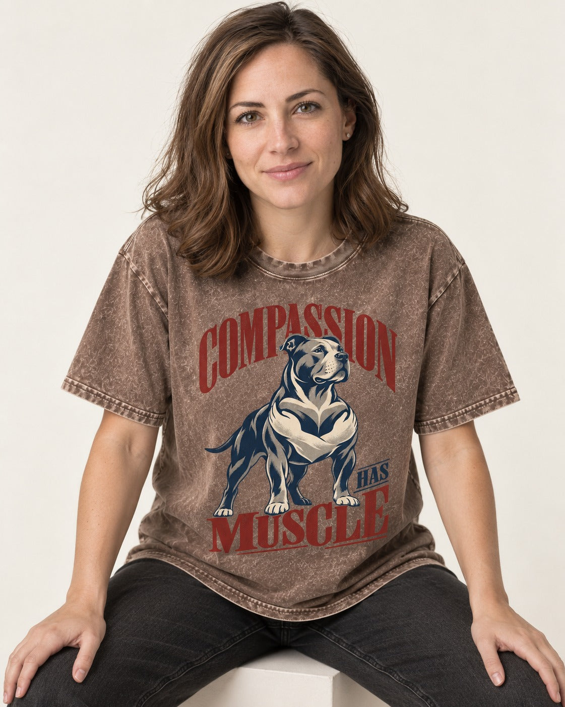 Pitbull Compassion Has Muscle Washed Tee in Coffee, worn by a seated model