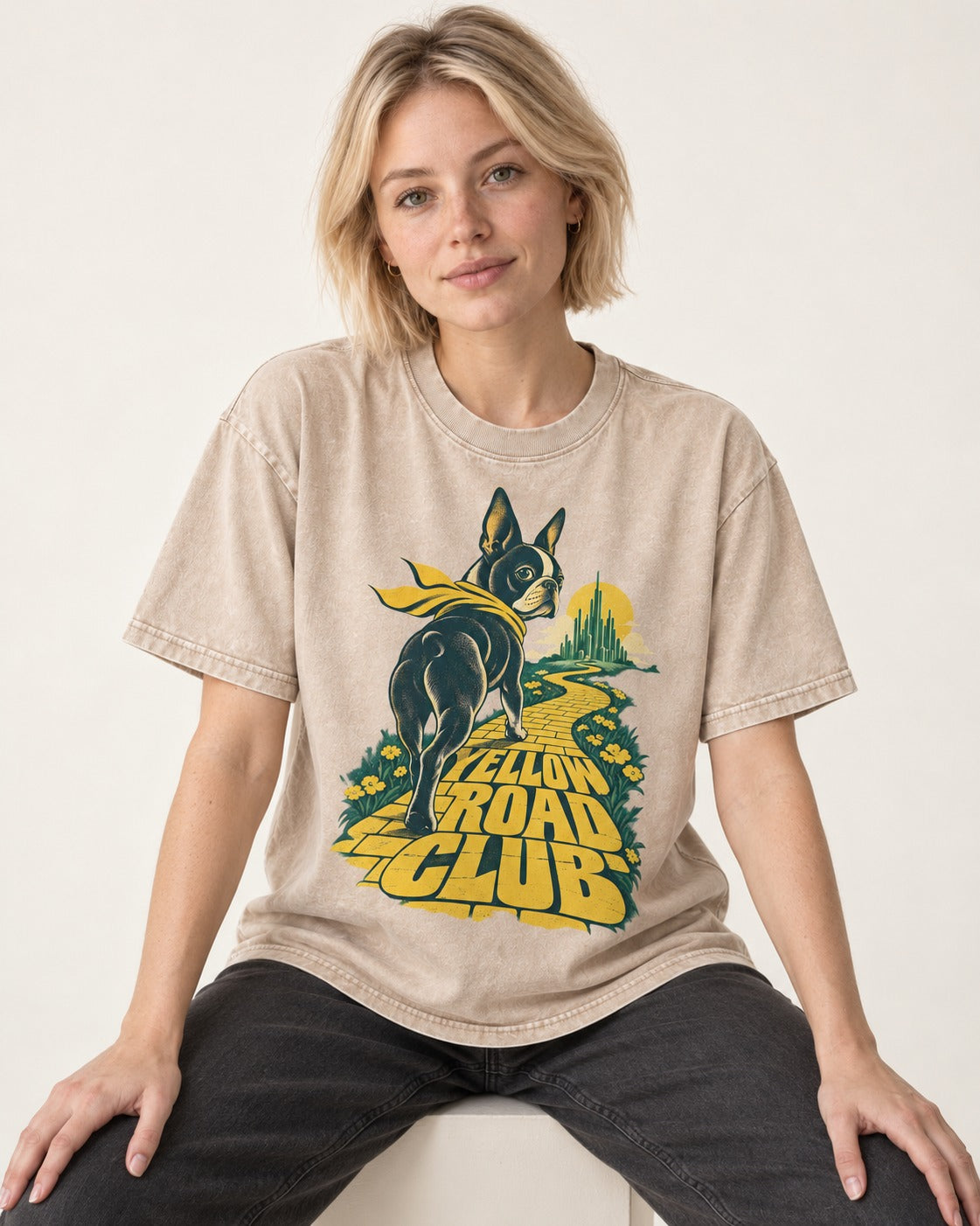 Boston Terrier Yellow Road Club Washed Tee in Apricot, worn by a seated model