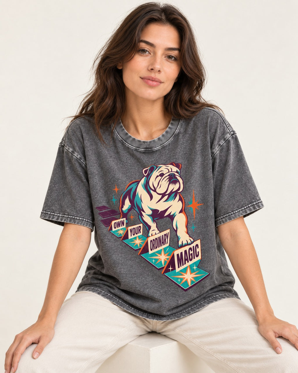 English Bulldog's Ordinary Magic Washed Tee in Gray, worn by a seated model