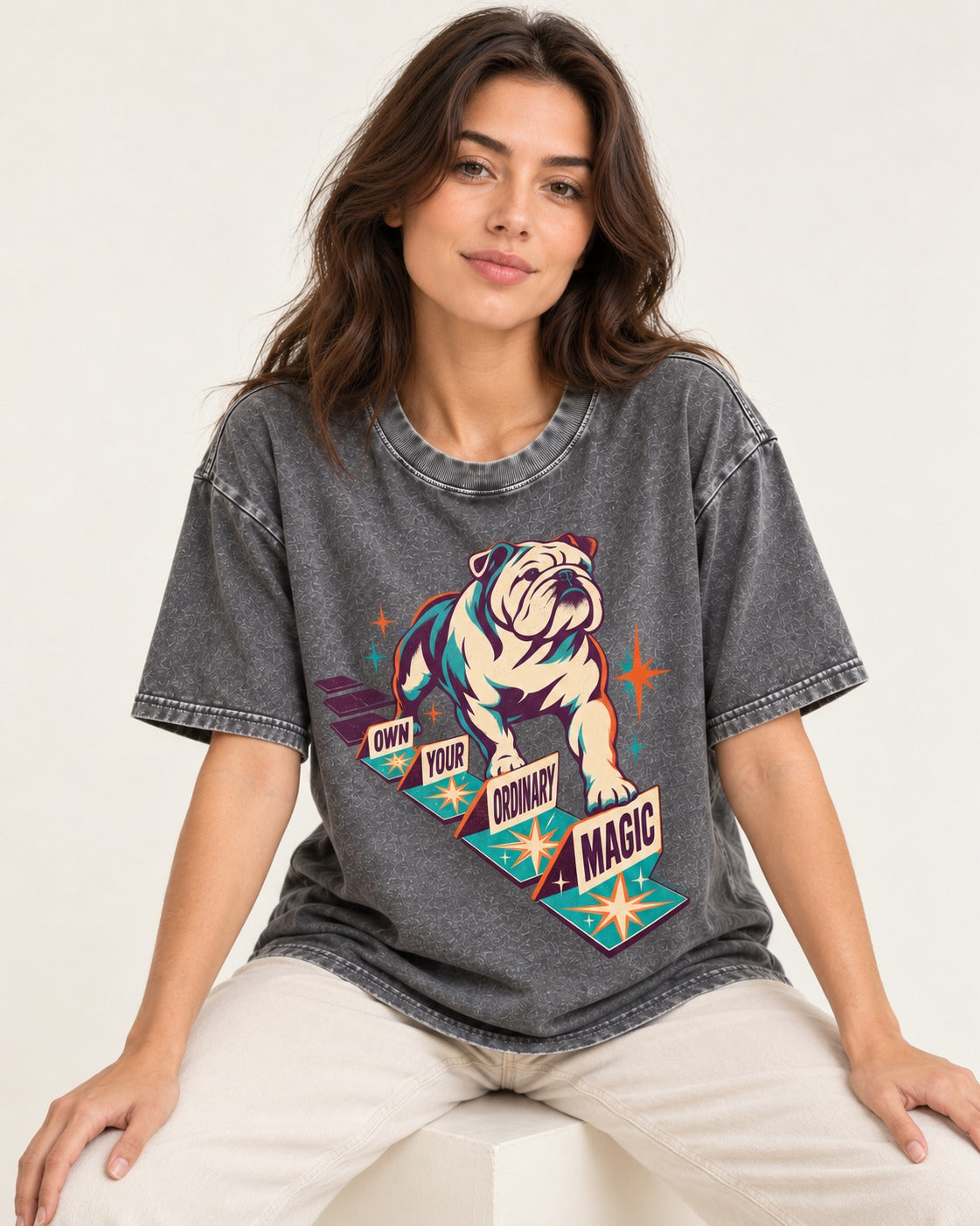 English Bulldog's Ordinary Magic Washed Tee in Gray, worn by a seated model