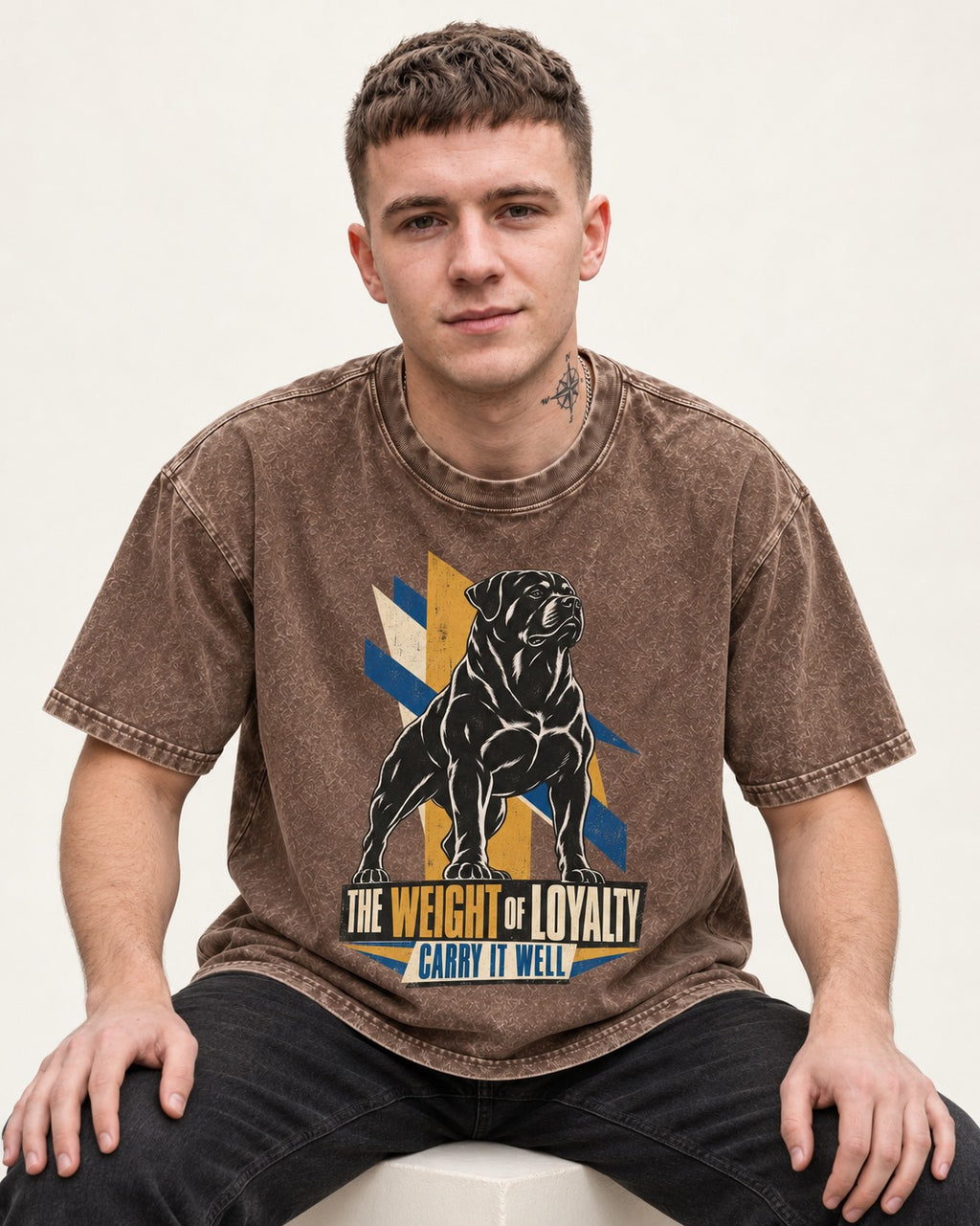 Rottweiler Weight of Loyalty Washed Tee in Coffee, worn by a seated model