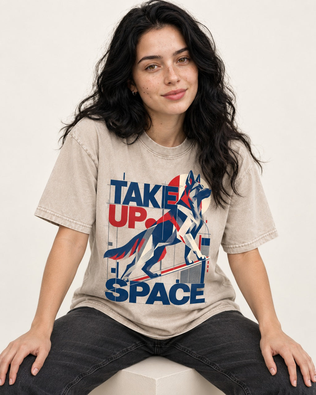 Take Up Space German Shepherd Dog Washed Tee in Apricot, worn by a seated model