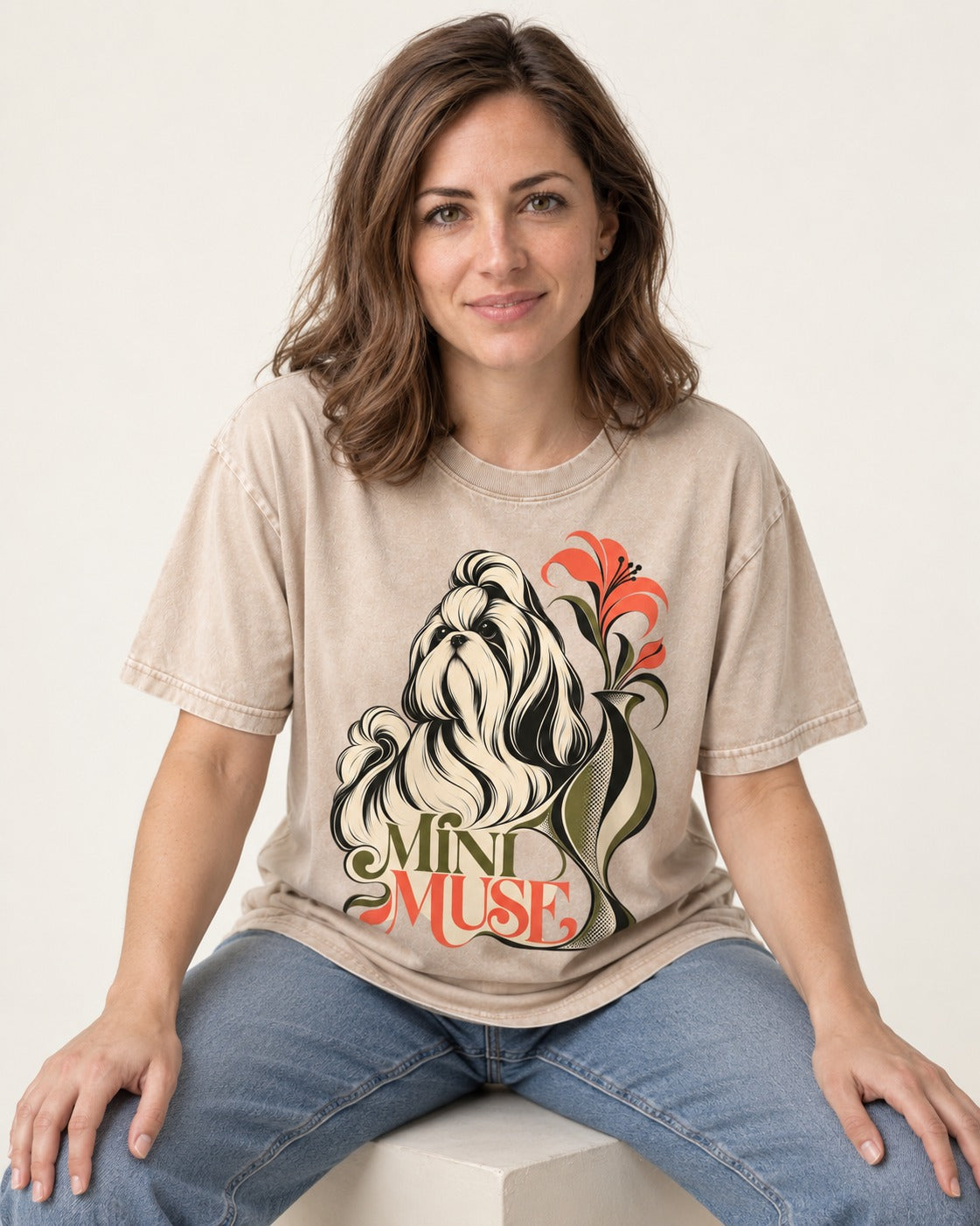 Shih Tzu Mini Muse Washed Tee in Apricot, worn by a seated model