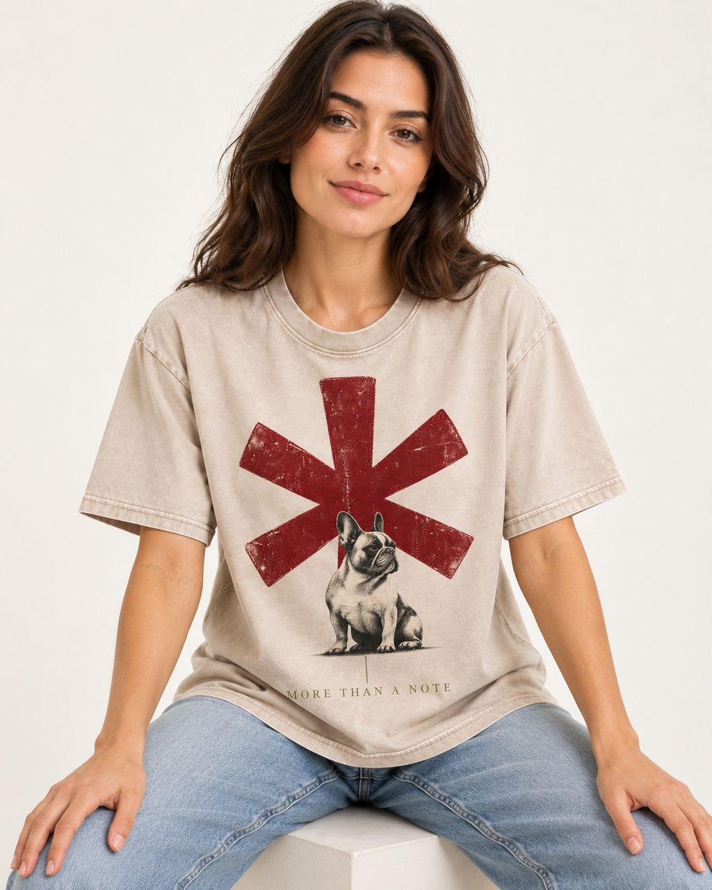 Frenchie More Than a Note Washed Tee in Apricot, worn by a seated model