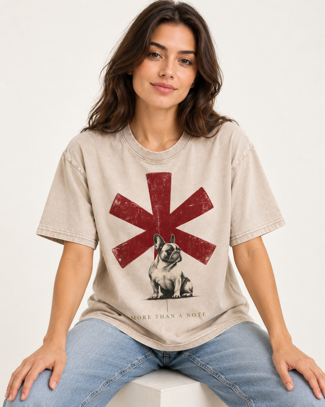 Frenchie More Than a Note Washed Tee in Apricot, worn by a seated model