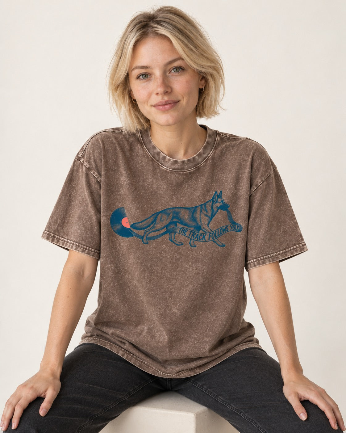 German Shepherd Dog The Track Follows You Washed Tee in Coffee, worn by a seated model