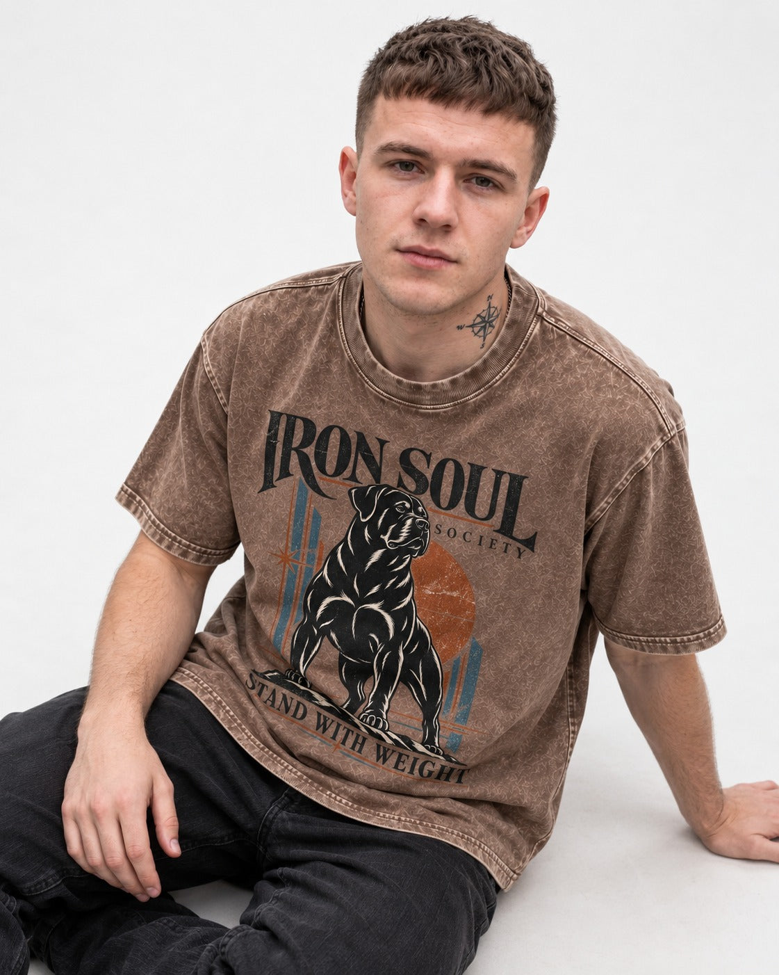 Rottweiler Iron Soul Society Washed Tee in Coffee, worn by a seated model