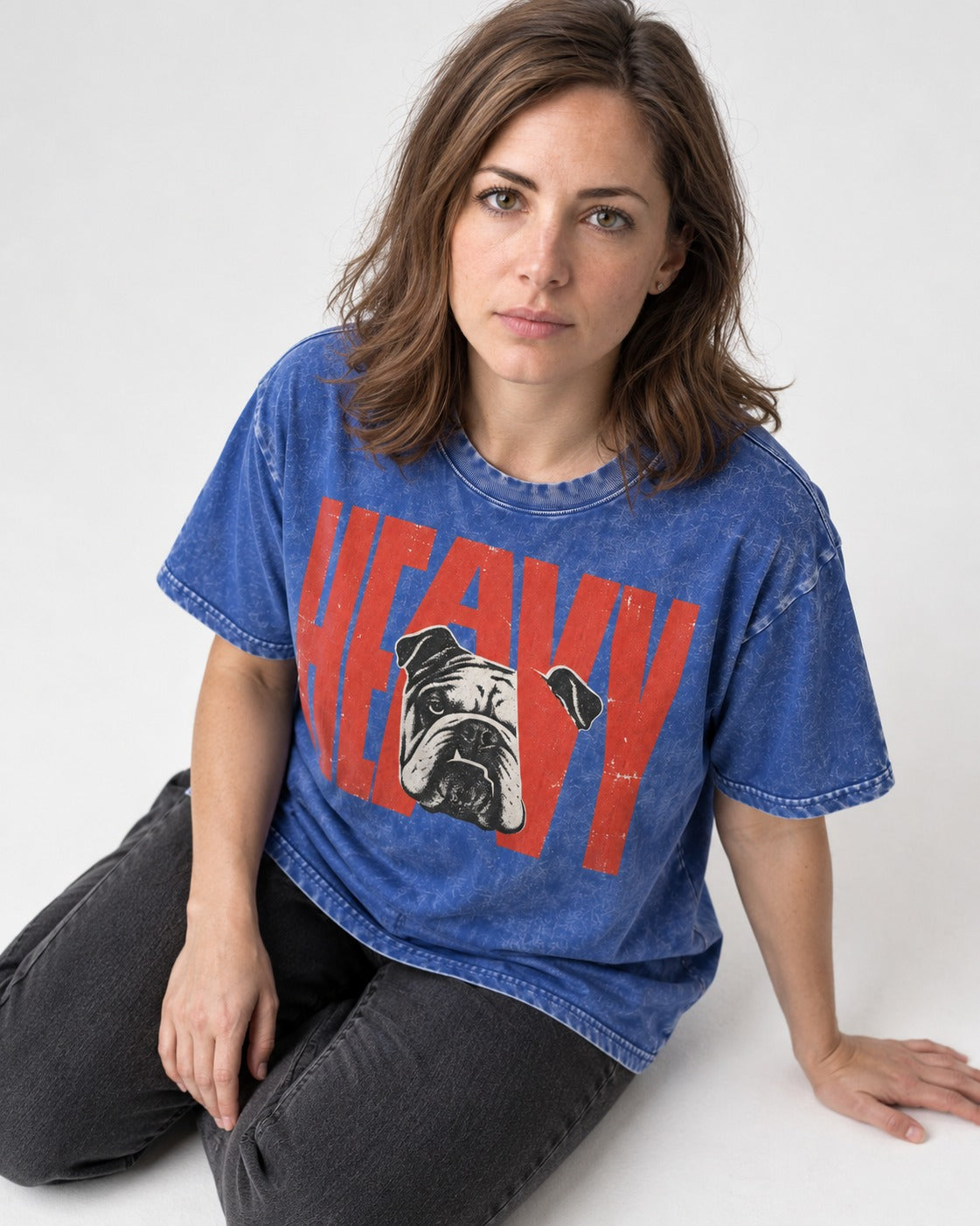 English Bulldog Heavy Stacked Portrait Graphic Washed Tee in Royal Blue, worn by a seated model
