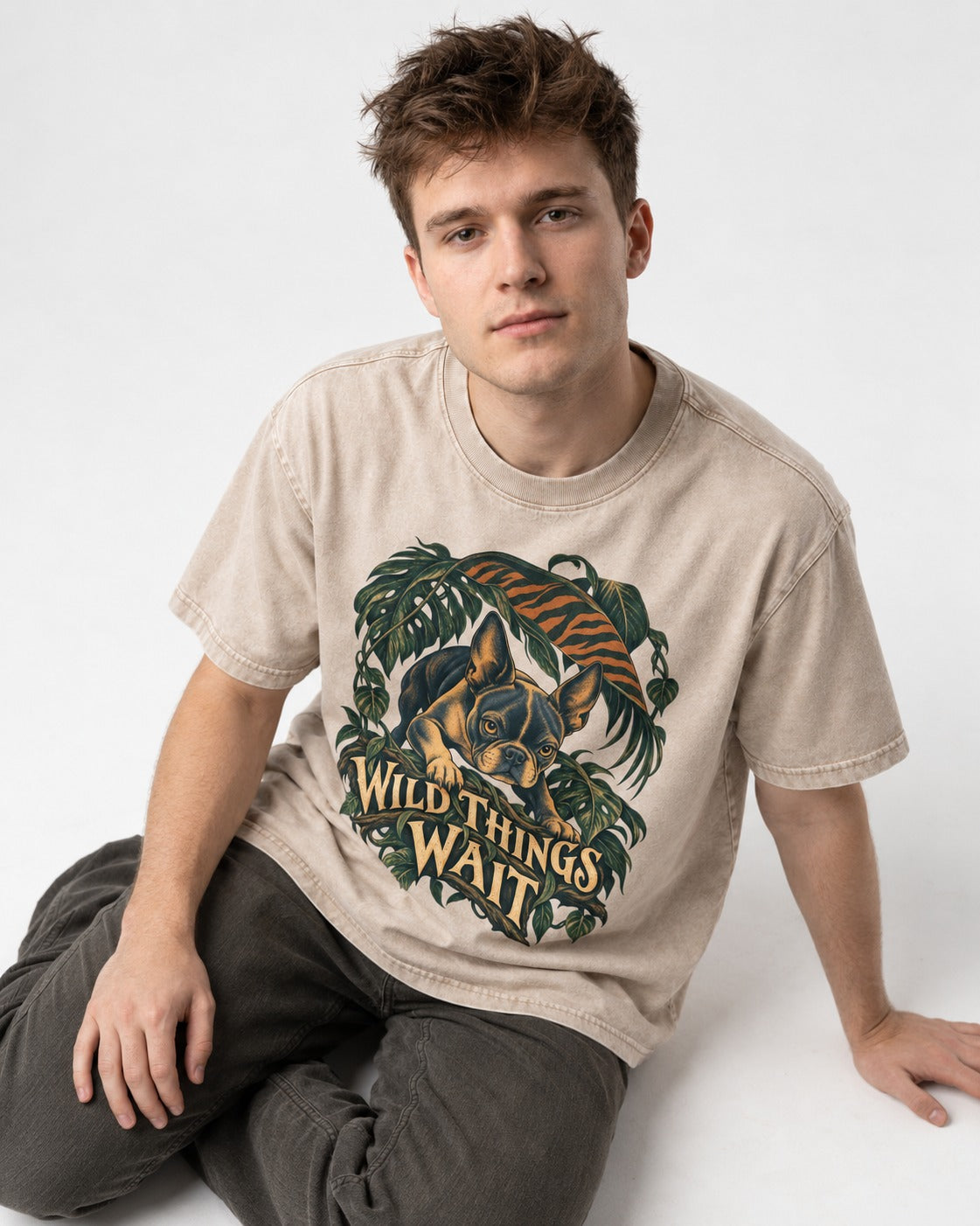 Boston Terrier Wild Things Wait Washed Tee in Apricot, worn by a seated model