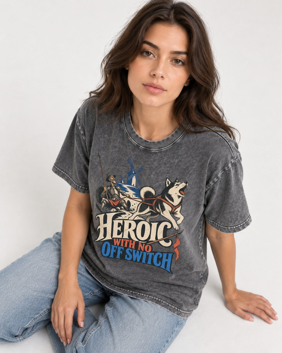 Husky Heroic with No Off Switch Don Quixote Graphic Washed Tee in Gray, worn by a seated model