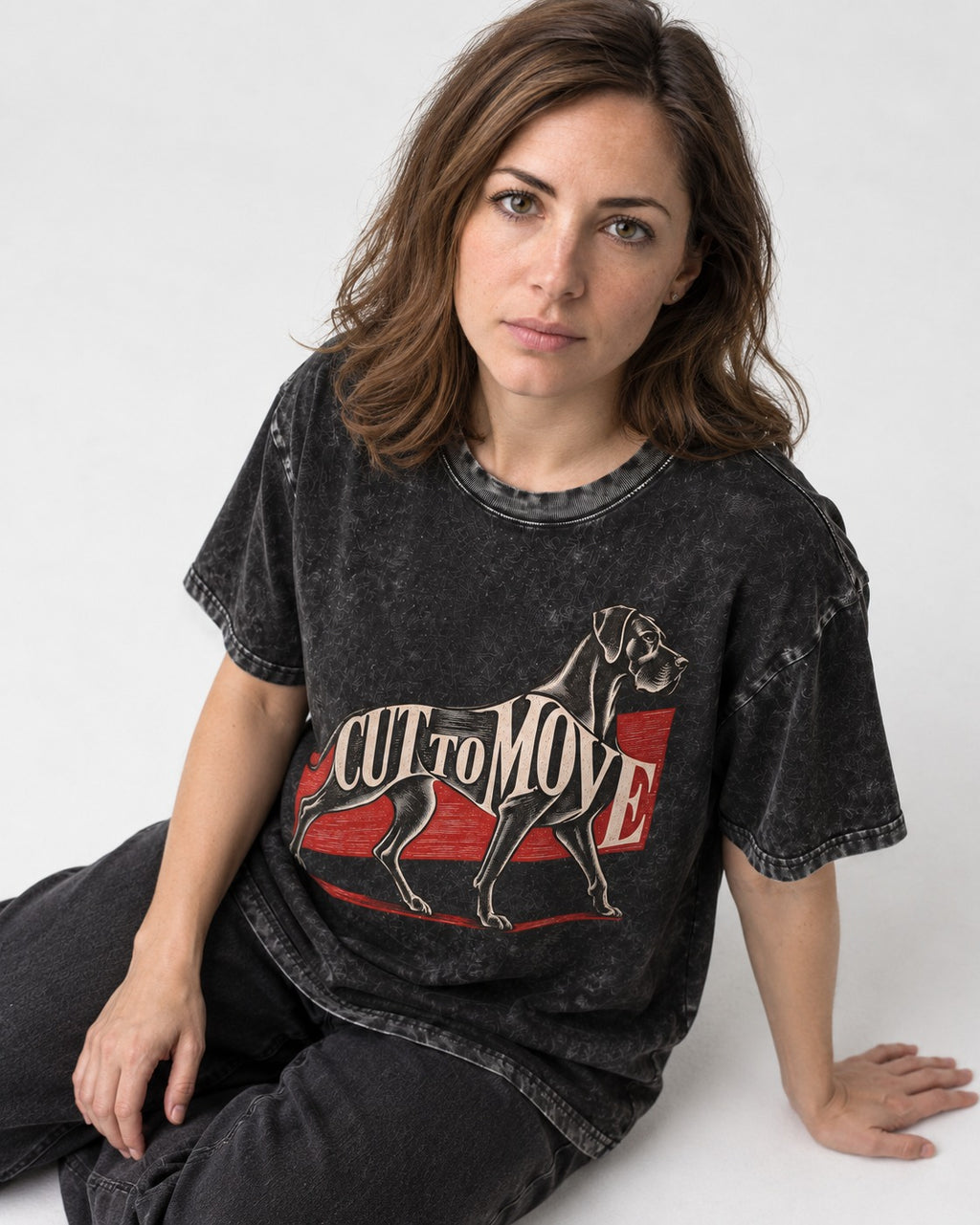 Great Dane Cut to Move Walking Typography Graphic Washed Tee in Black, worn by a seated model