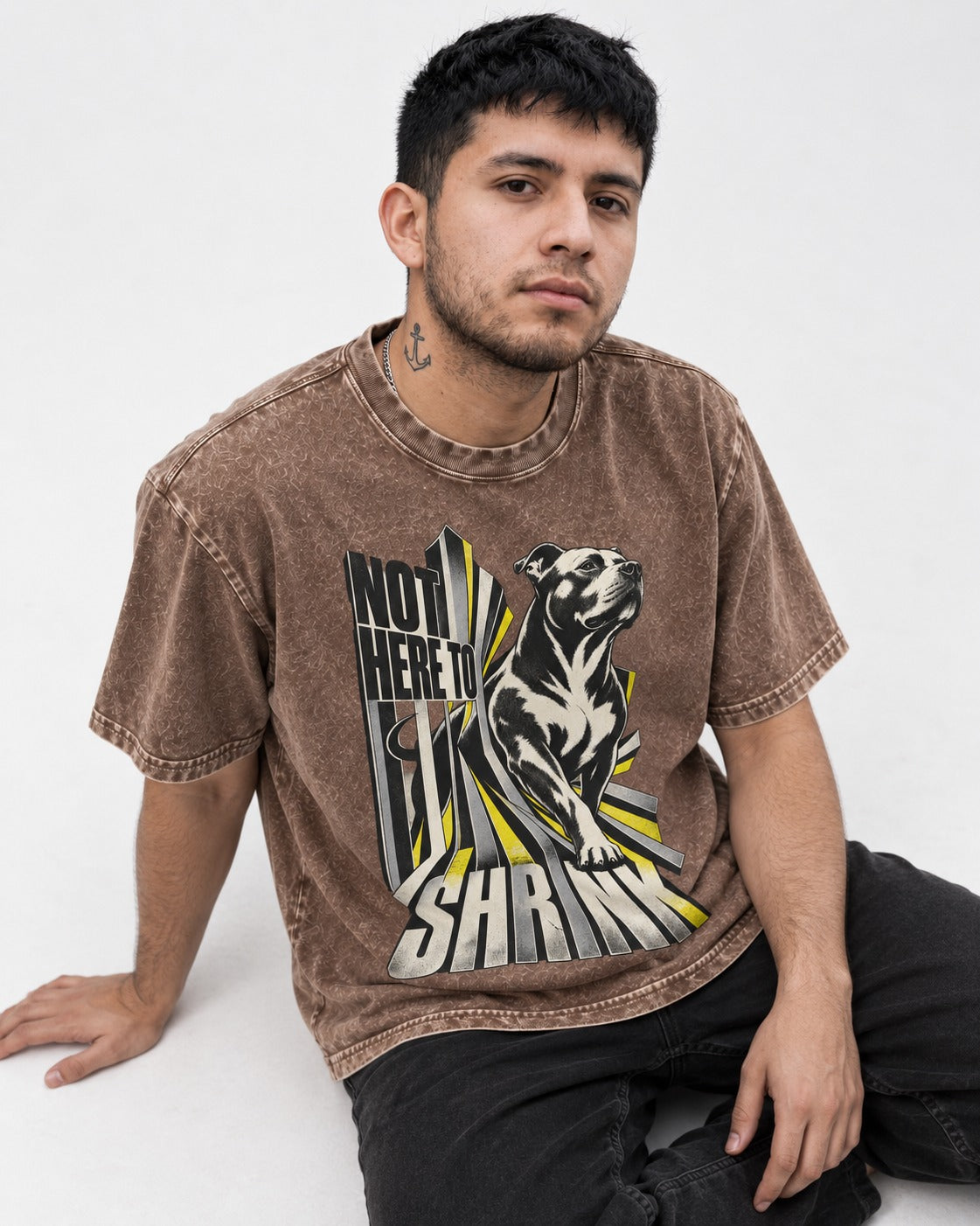 Not Here to Share Pitbull Washed Tee in Coffee, worn by a seated model