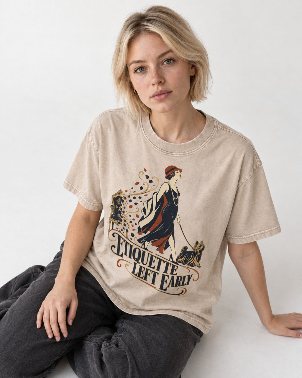 Yorkshire Terrier Etiquette Left Early Washed Tee in Apricot, worn by a seated model