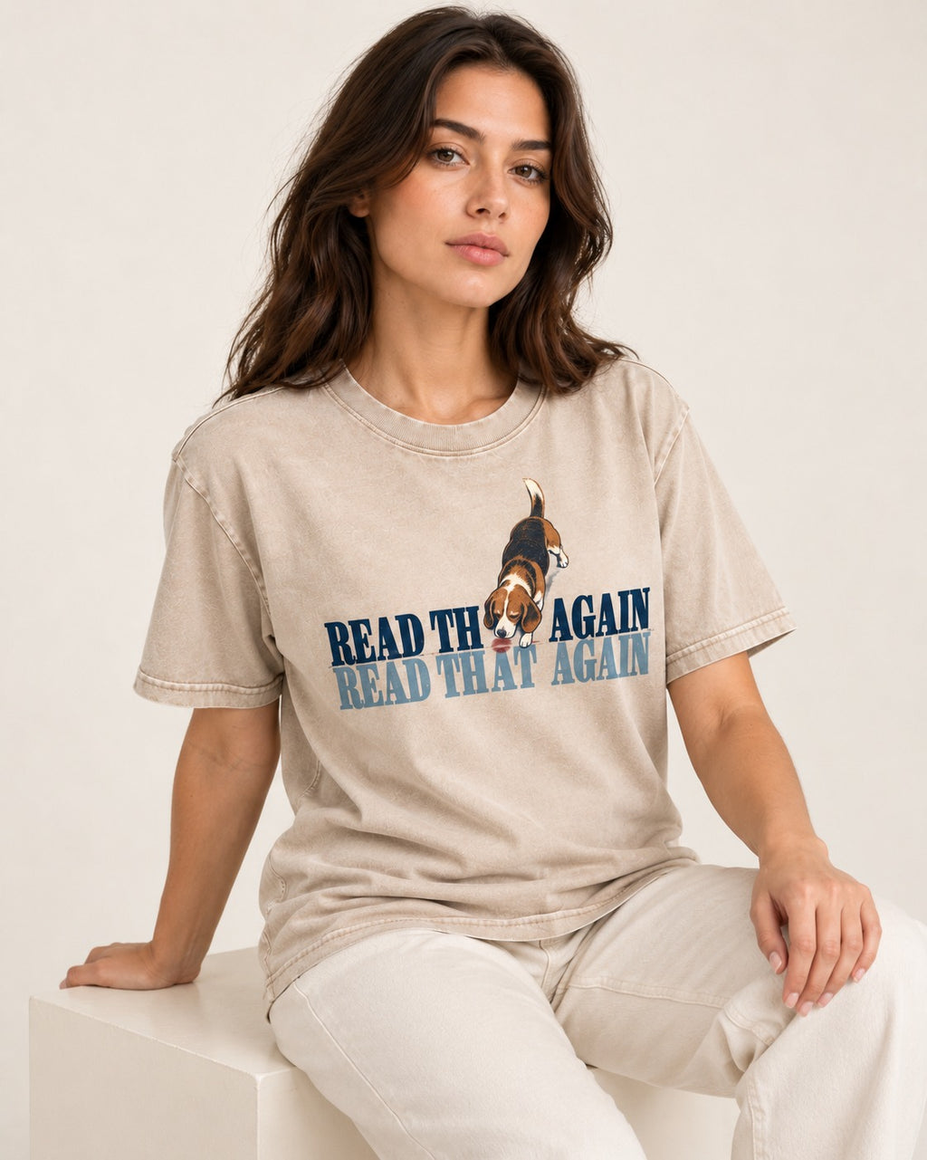 Read That Again Beagle Washed Tee in Apricot, worn by a seated model