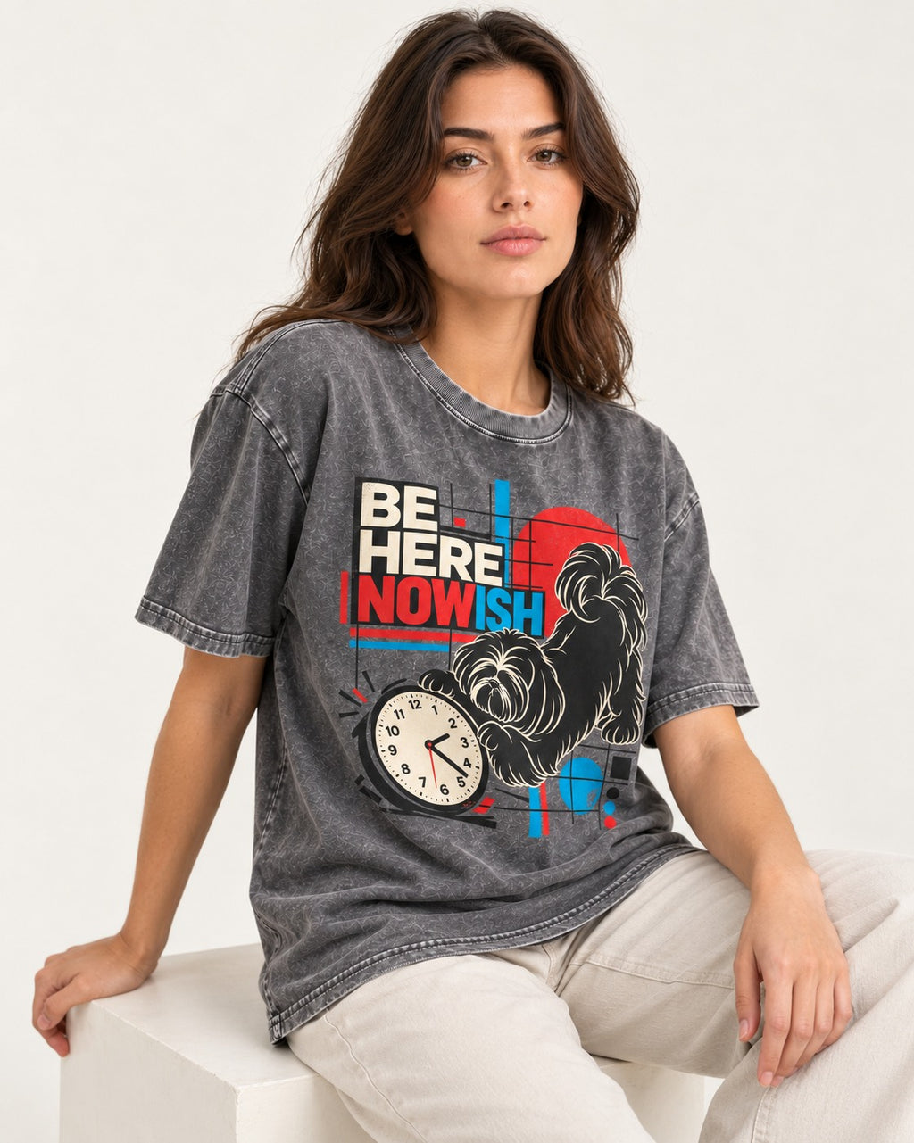 Be Here Nowish Shih Tzu Washed Tee in Gray, worn by a seated model