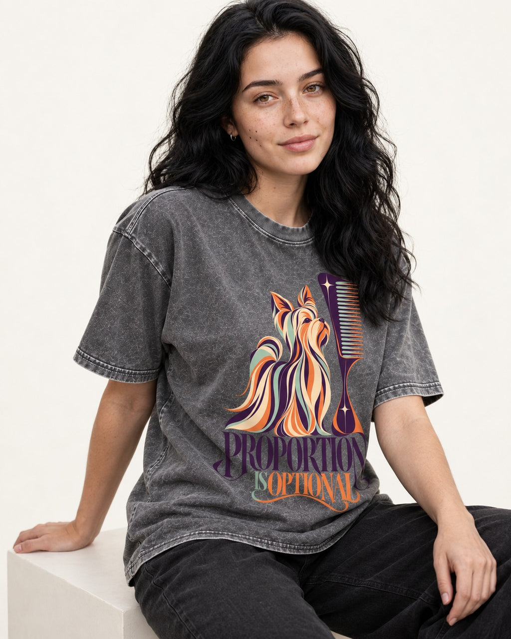 Yorkshire Terrier Proportion Is Optional Washed Tee in Gray, worn by a seated model