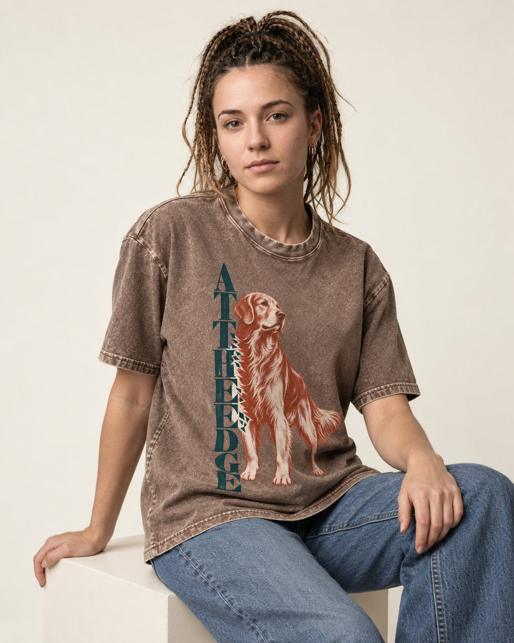 Golden Retriever At the Edge Washed Tee in Coffee, worn by a seated model