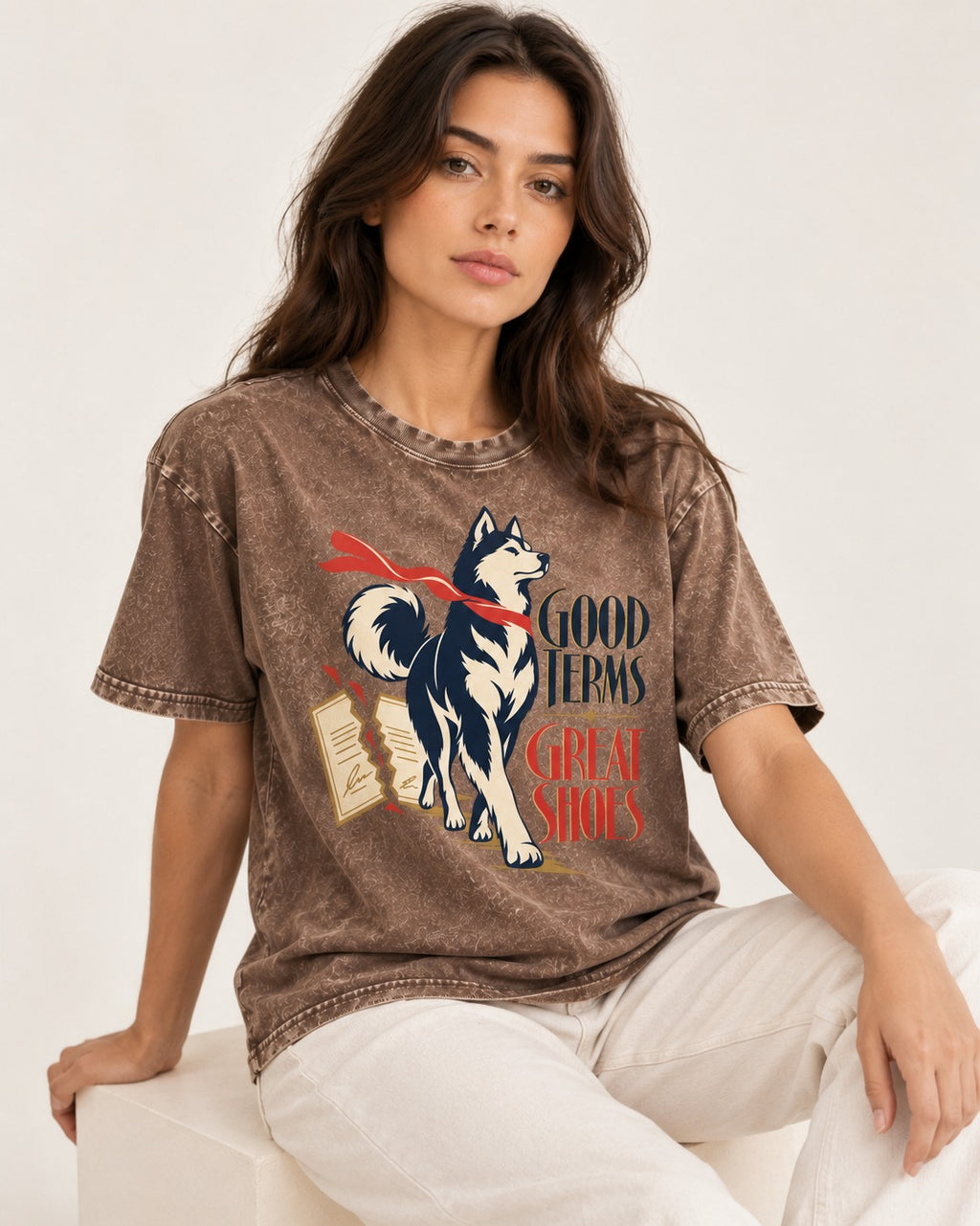 Husky Good Terms Great Shoes Washed Tee in Coffee, worn by a seated model