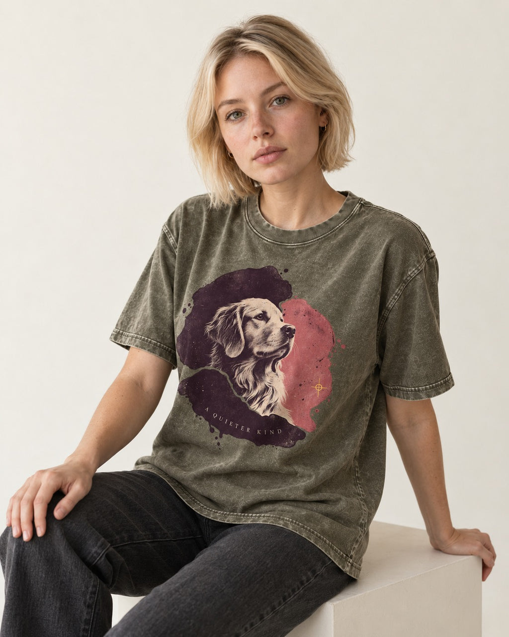 Golden Retriever A Quieter Kind Ink Wash Portrait Graphic Washed Tee in Army Green, worn by a seated model