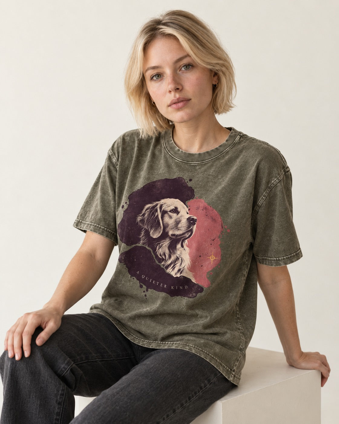 Golden Retriever A Quieter Kind Ink Wash Portrait Graphic Washed Tee in Army Green, worn by a seated model