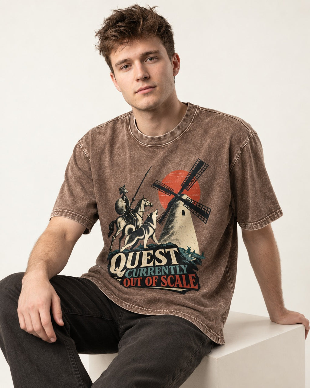 Husky Quest Out of Scale Washed Tee in Coffee, worn by a seated model