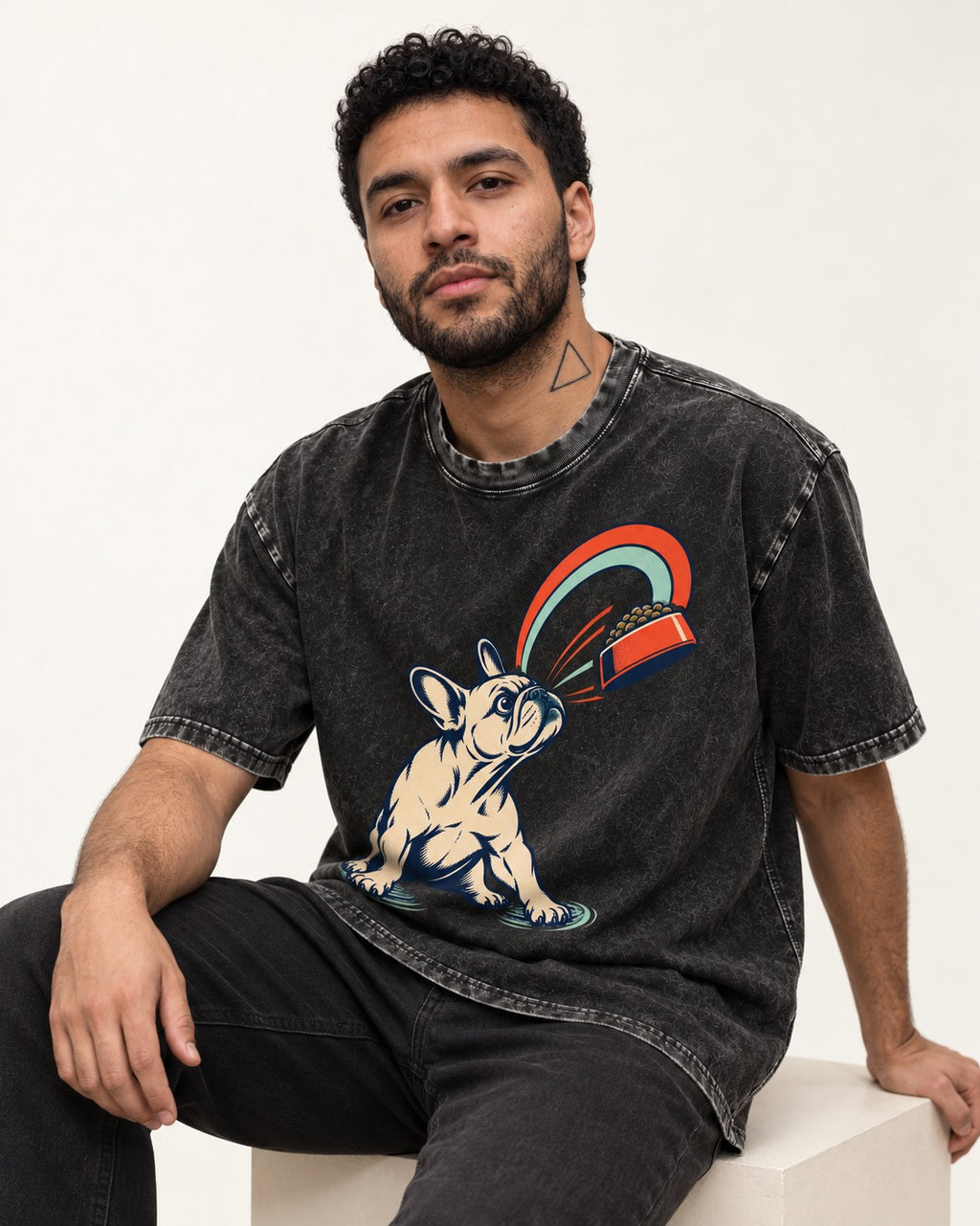 Frenchie Dinner Magnet Graphic Washed Tee in Black, worn by a seated model