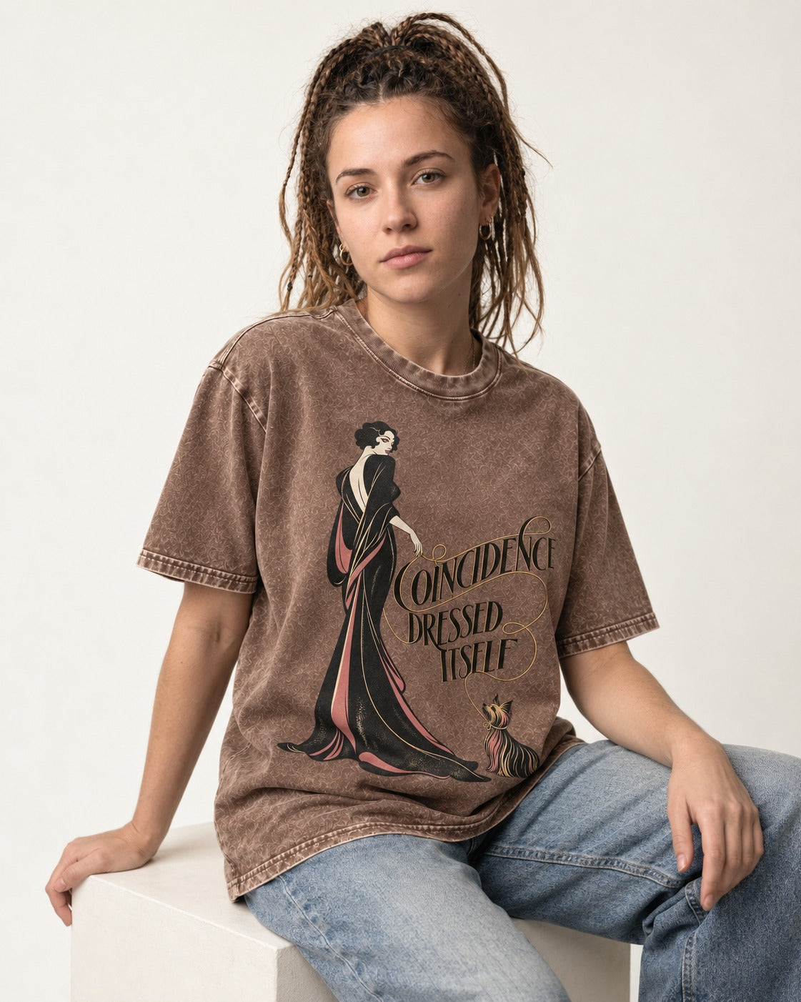 Yorkshire Terrier Coincidence Dressed Itself Art Deco Graphic Washed Tee in Coffee, worn by a seated model