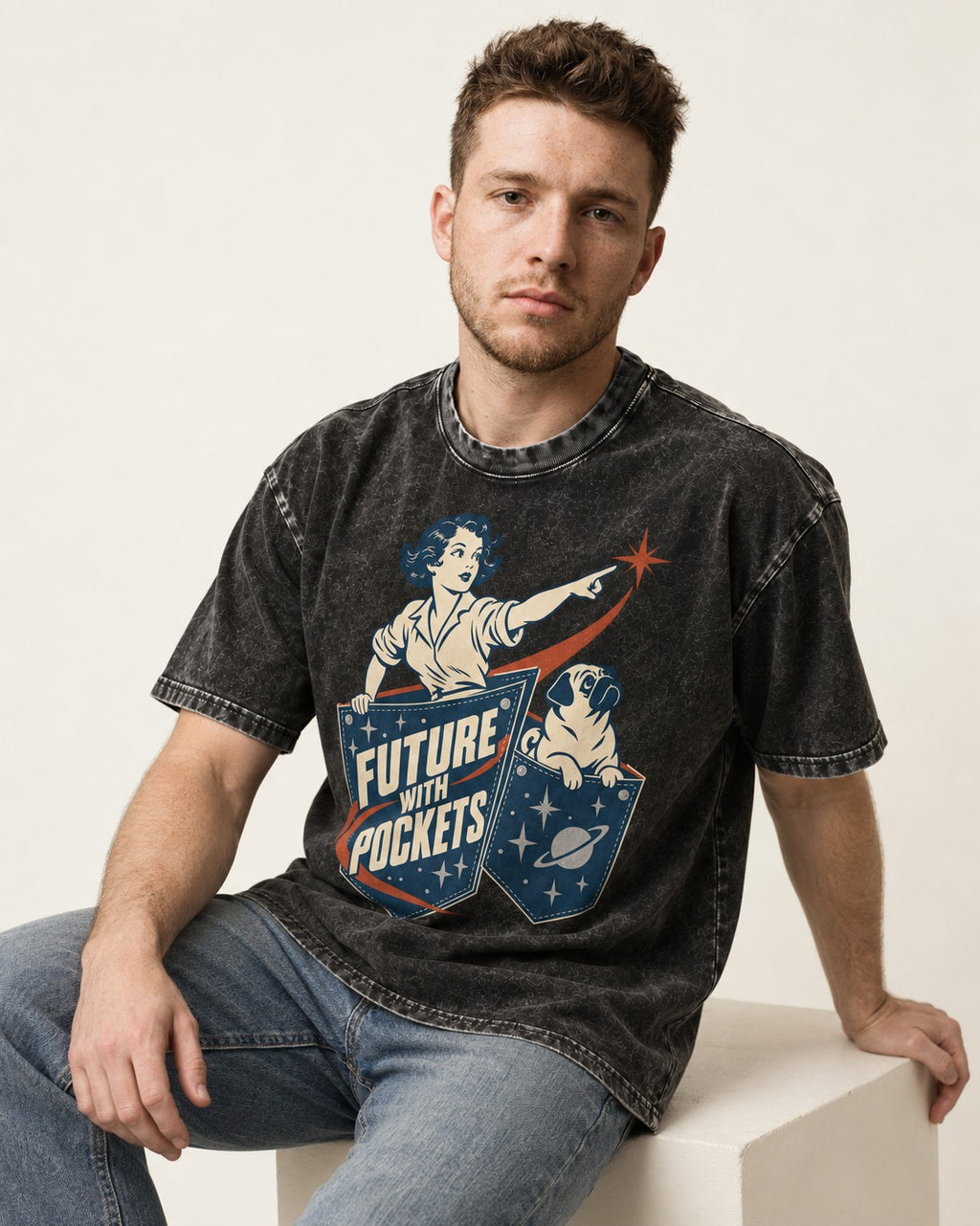 Pug Future with Pockets Space Pocket Graphic Washed Tee in Black, worn by a seated model