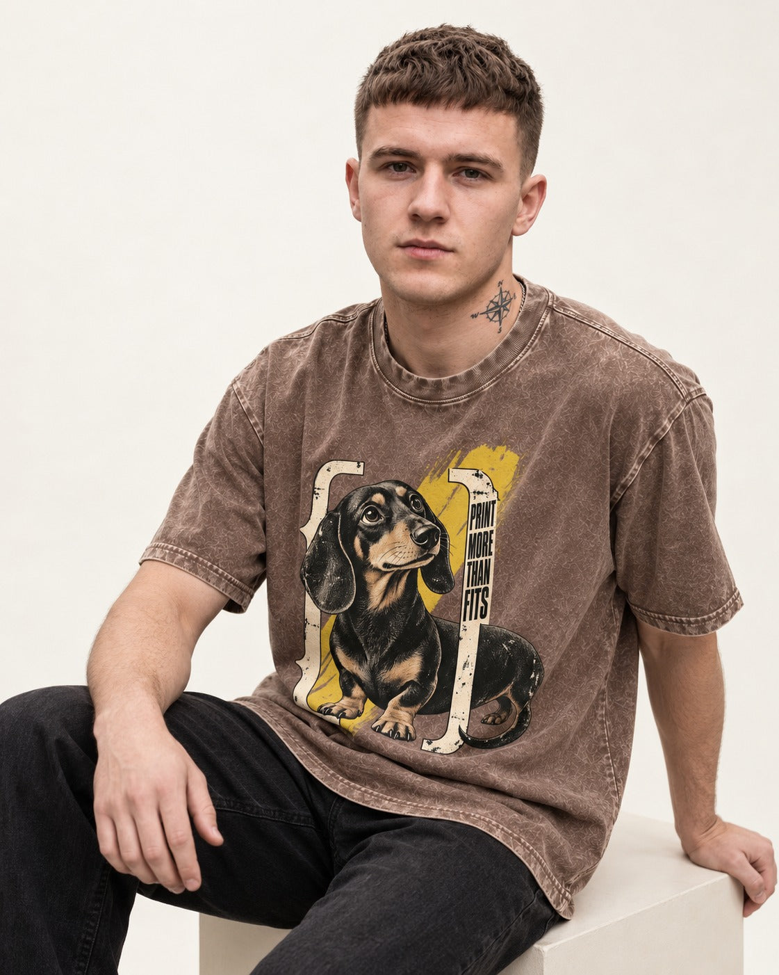 Dachshund More Than Fits Washed Tee in Coffee, worn by a seated model