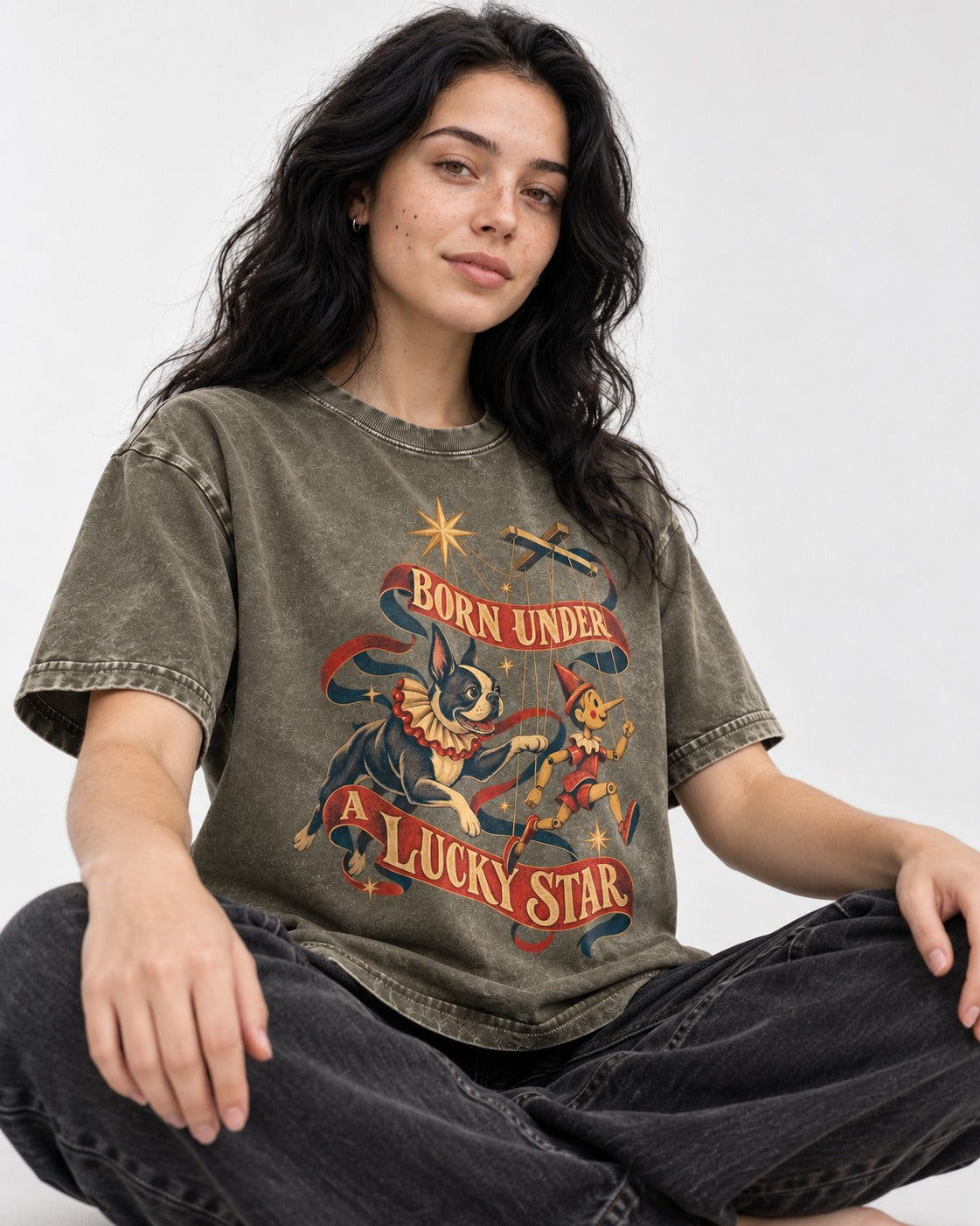 Born Under a Lucky Star Boston Terrier Washed Tee in Army Green, worn by a seated model