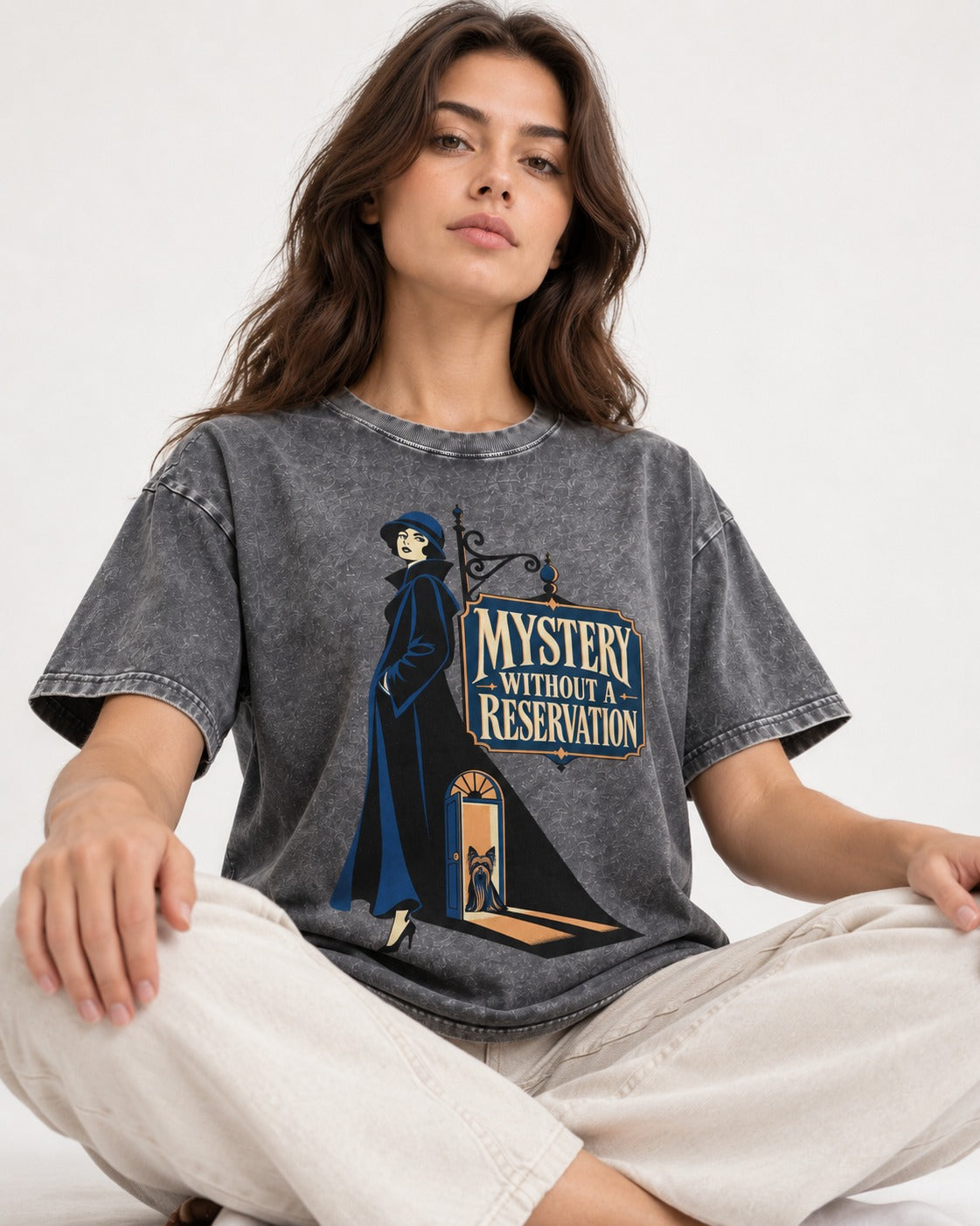 Mystery Without a Reservation Yorkshire Terrier Washed Tee in Gray, worn by a seated model