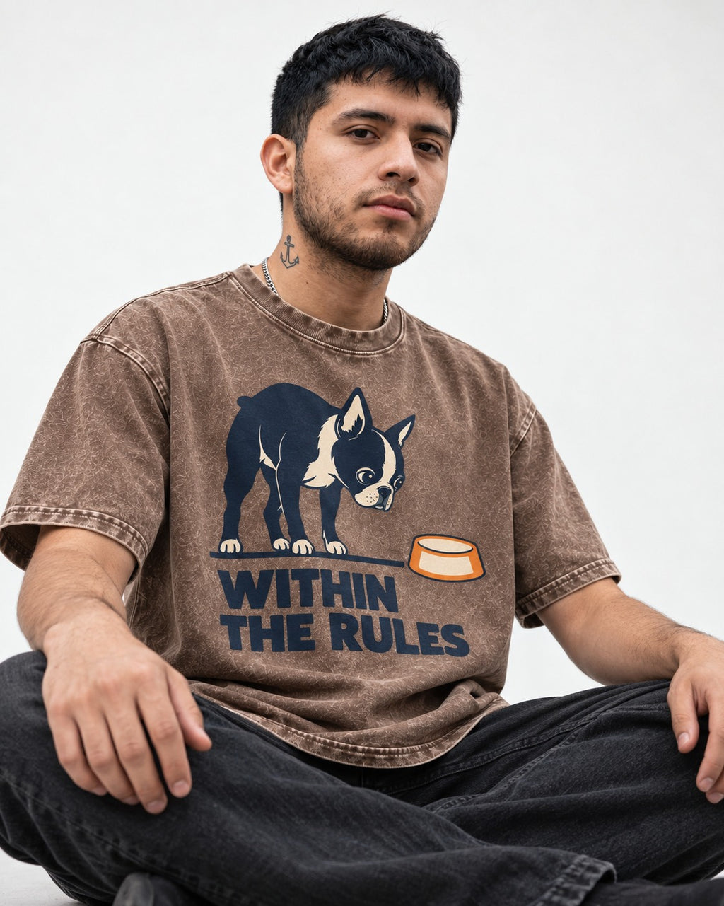Within the Rules Boston Terrier Washed Tee in Coffee, worn by a seated model