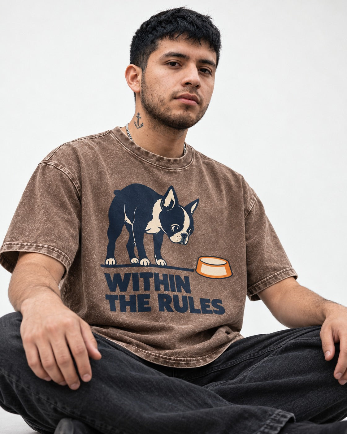 Within the Rules Boston Terrier Washed Tee in Coffee, worn by a seated model