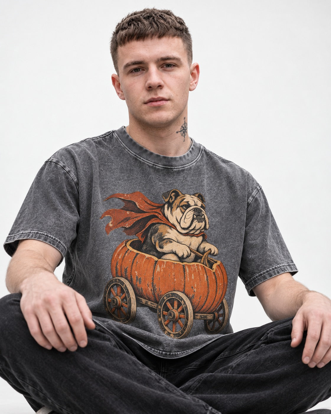 English Bulldog Midnight Magic Washed Tee in Gray, worn by a seated model