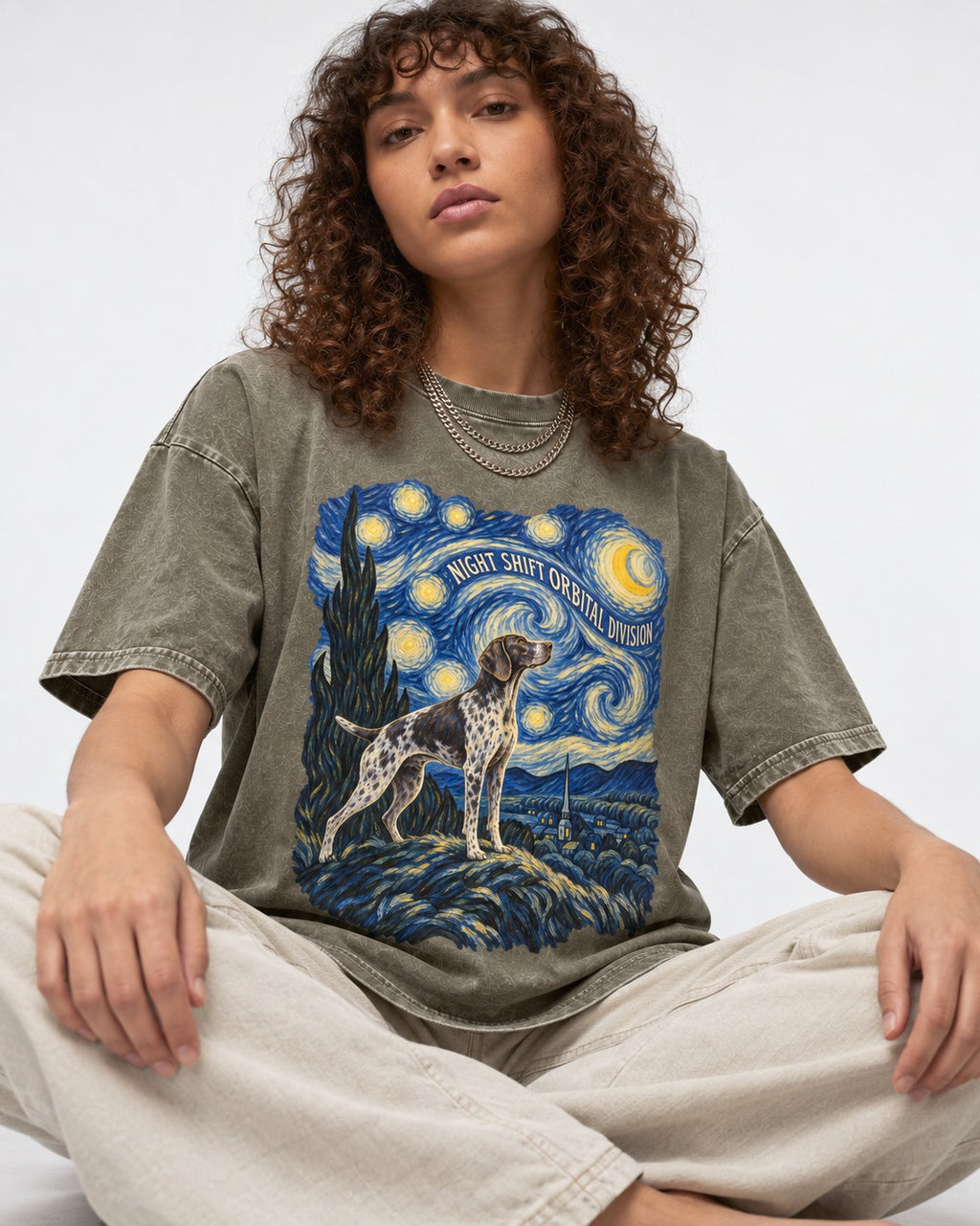 German Shorthaired Pointer Night Shift Orbital Division Starry Night Graphic Washed Tee in Army Green, worn by a seated model