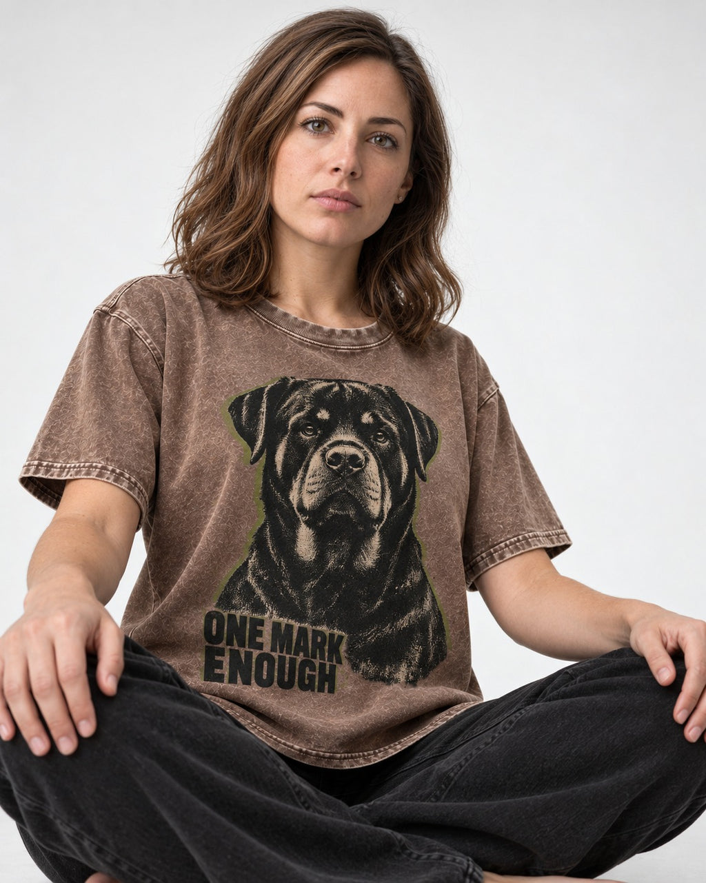 Rottweiler One Mark Enough Distressed Portrait Graphic Washed Tee in Coffee, worn by a seated model