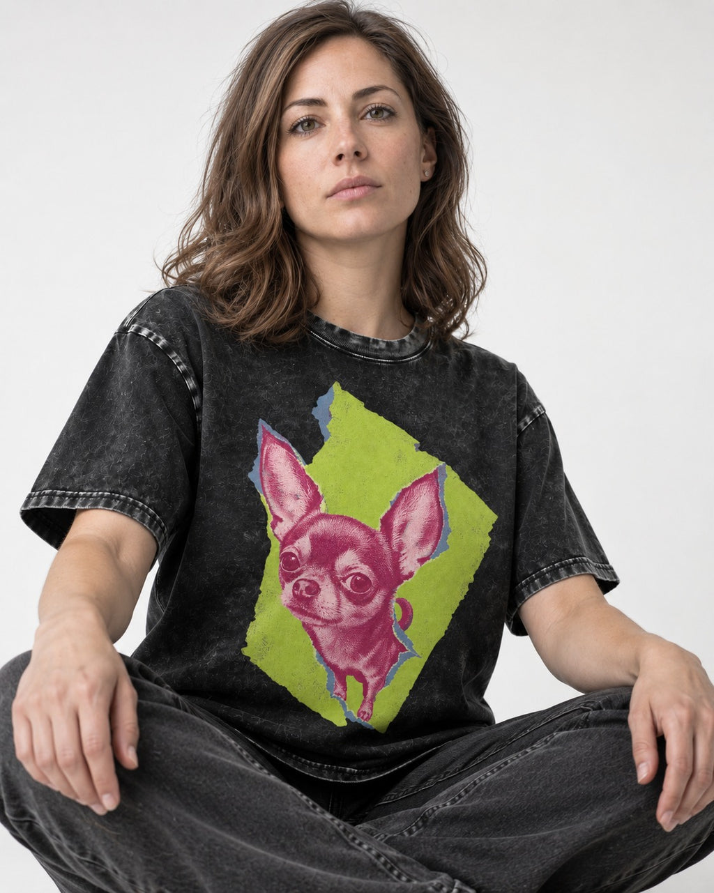 Torn-Paper Chihuahua Portrait Washed Tee in Black, worn by a seated model