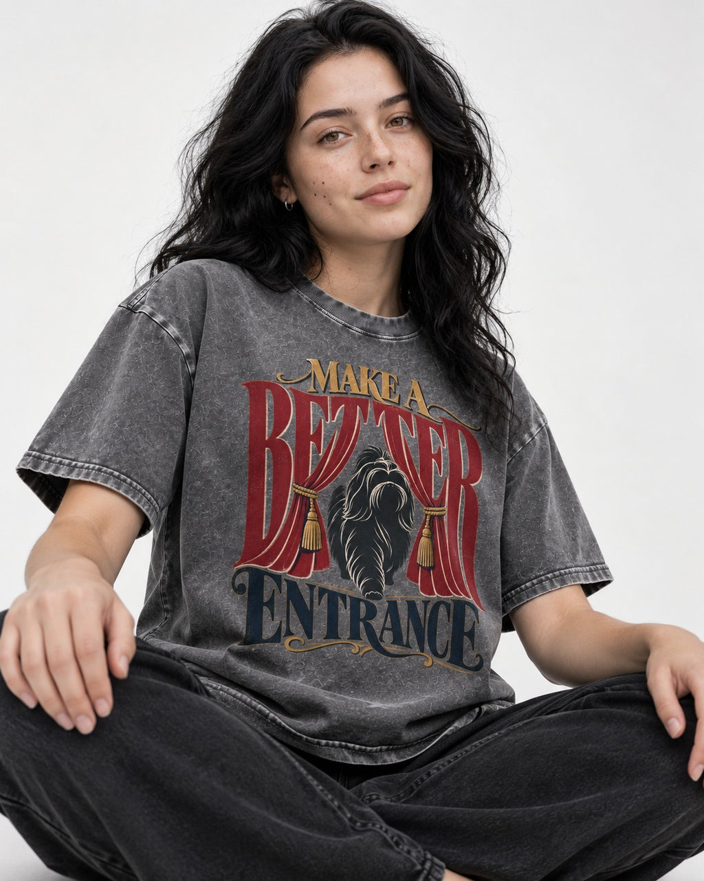 A Better Shih Tzu Entrance Washed Tee in Gray, worn by a seated model